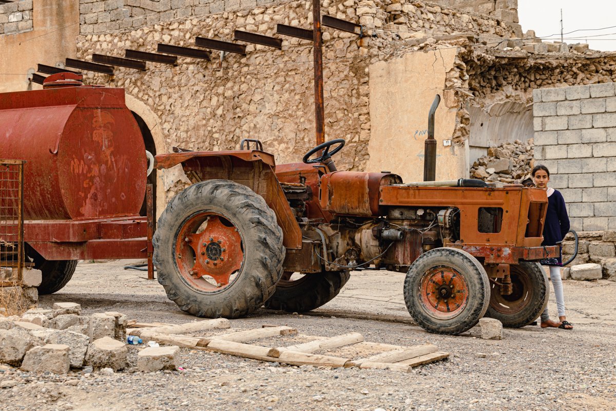 Old farm machinery is still in use.