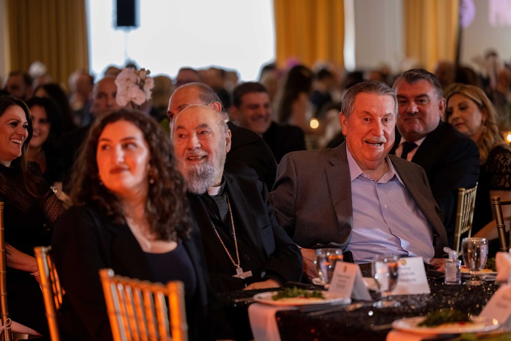  Bishop Ibrahim and Raad Kathawa enjoying the program. 