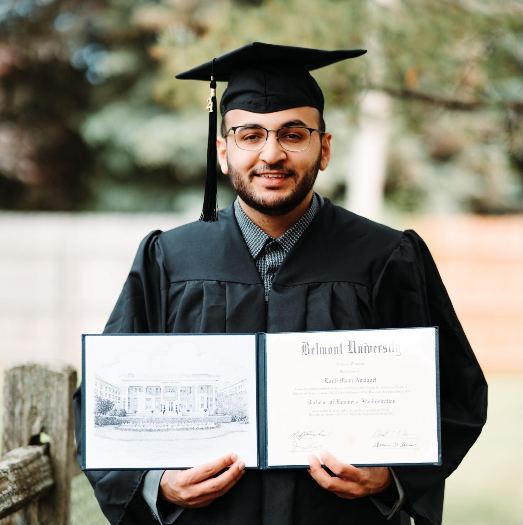  Laith Amanoel with his diploma 