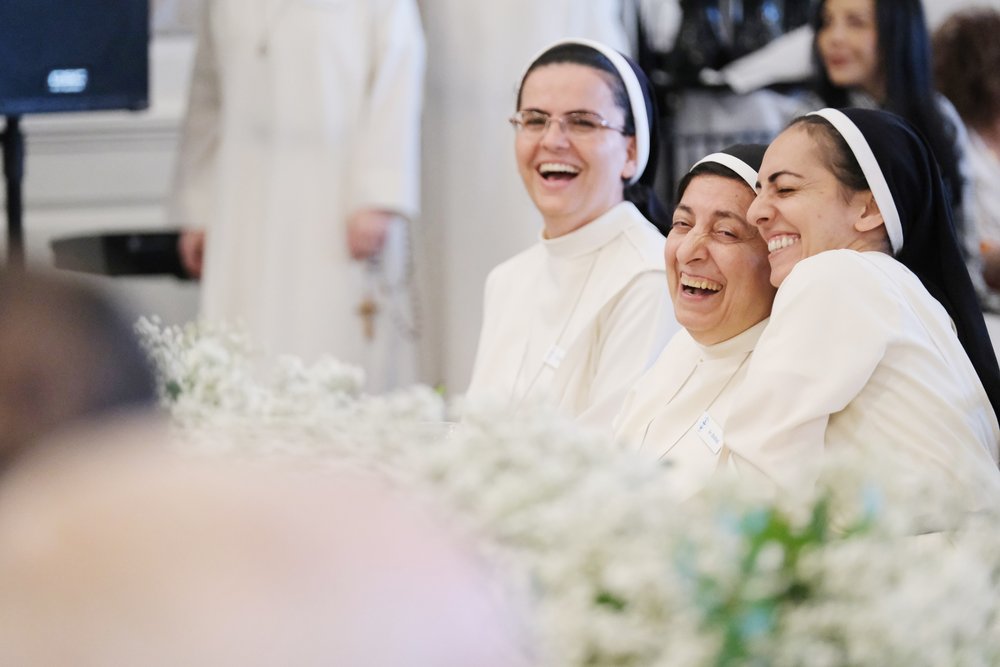   Sr. Angela, Sr. Ibtihaj and Sr. Amanda having fun at the event. 