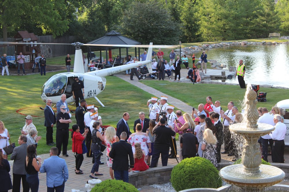  The event featured a live helicopter landing in the estate’s backyard.  