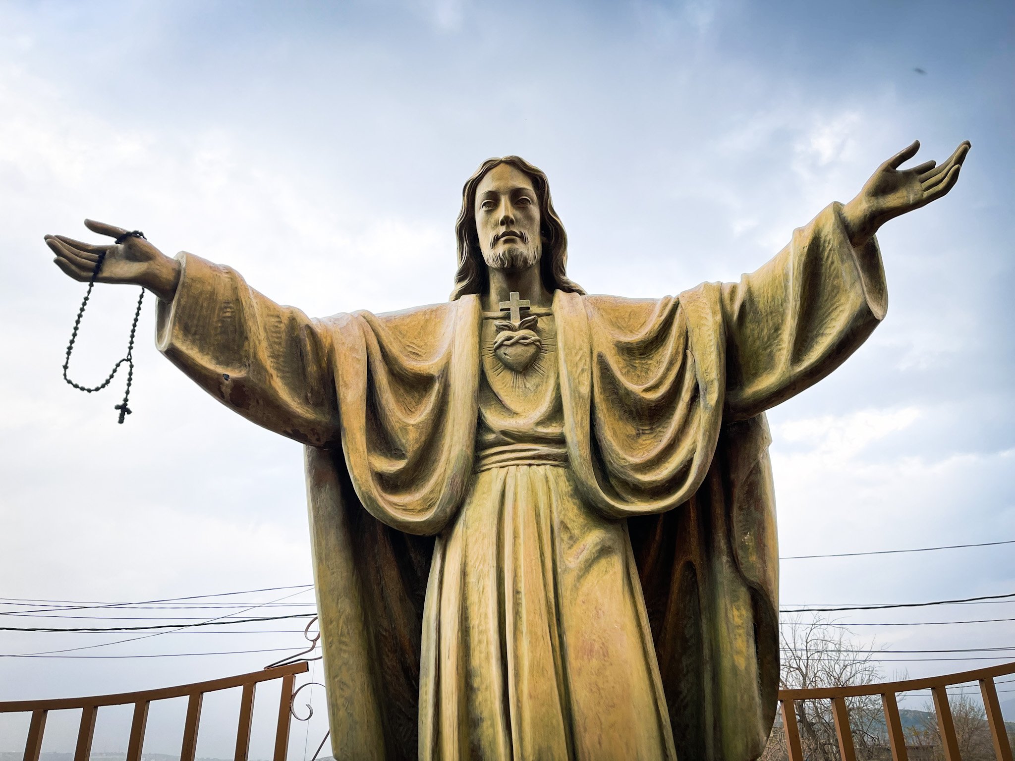The Jesus statue at Shaqlawa’s Martyr’s Church. Shaqlawa is a historic city and a hill station in the Erbil Governorate in the Kurdistan Region of Iraq, located at the bottom of Safeen Mountain. It was the home of Raban Booya, a Christian monk that
