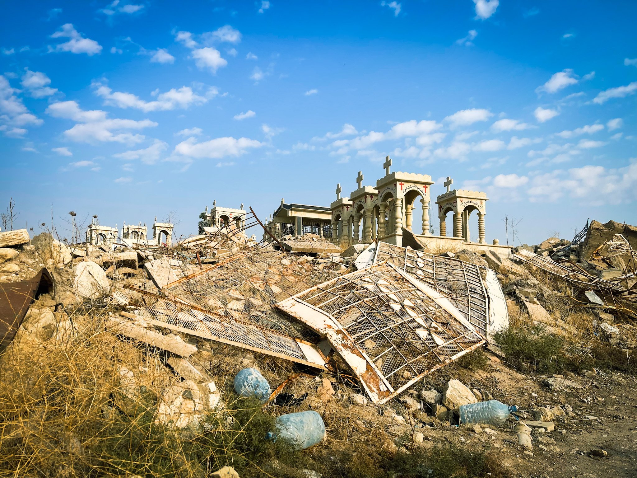 This cemetery in Tillkepe was destroyed by ISIS. It sits on a man-made hill built by King Sennacherib in approximately 2700 BC. The village of Tillkepe (“hill of stones”) was named after this hill. This hill also houses a well that is connected to t