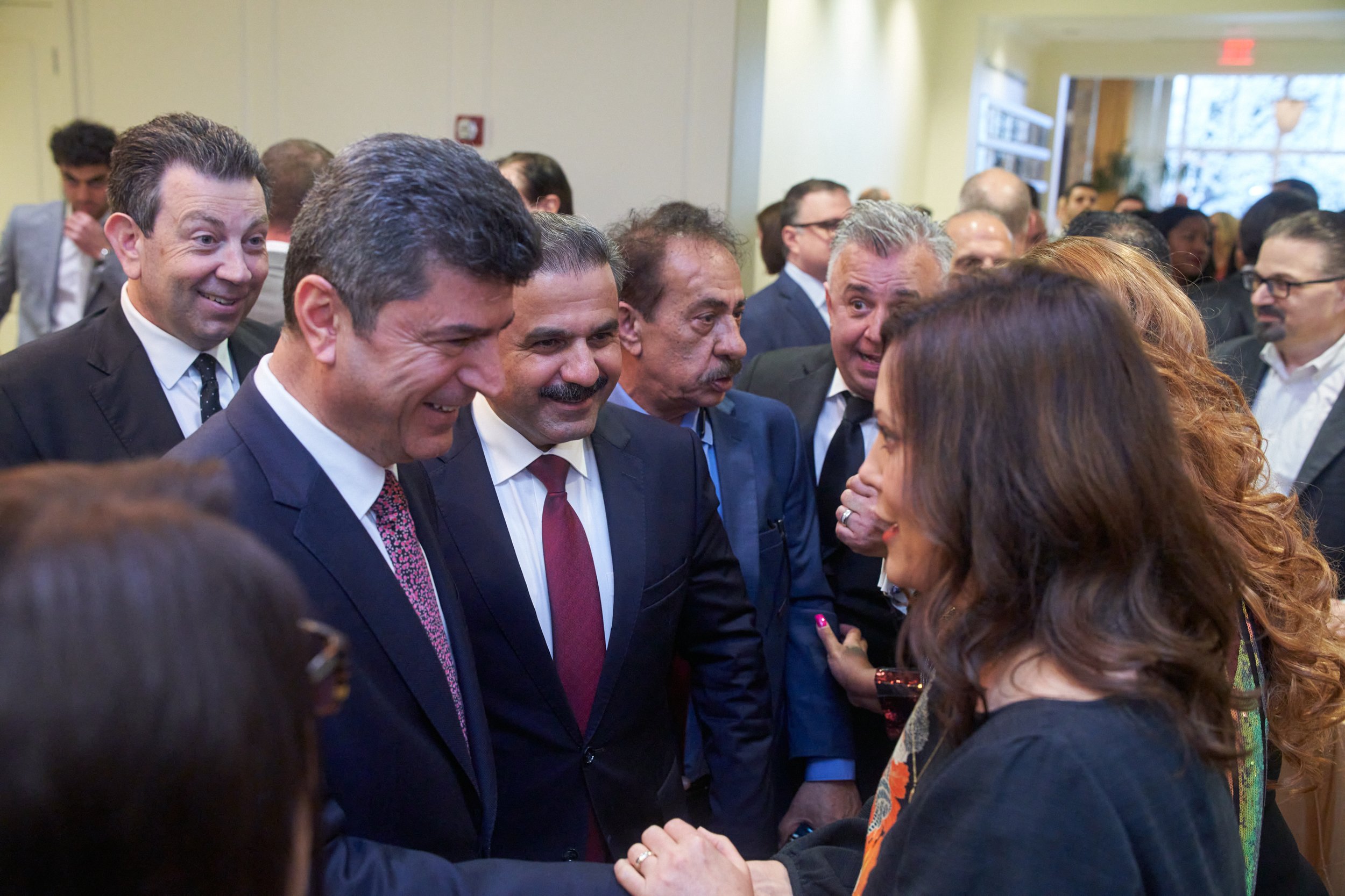  Governor Whitmer meets Dr. Ali Tatar, Governor of Dohuk, an Iraqi city in Nineveh Province, as CACC Board members look on.   