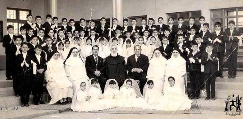  St. Joseph students, clergy, nuns and staff at a Communion event in Baghdad. 