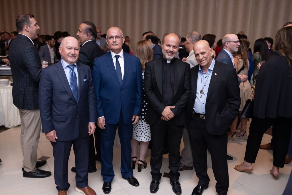  Left to right: Dr. Nahid Elyas, Salam Aboona, Fr. Ameer Brikha, and Tom Niami. 