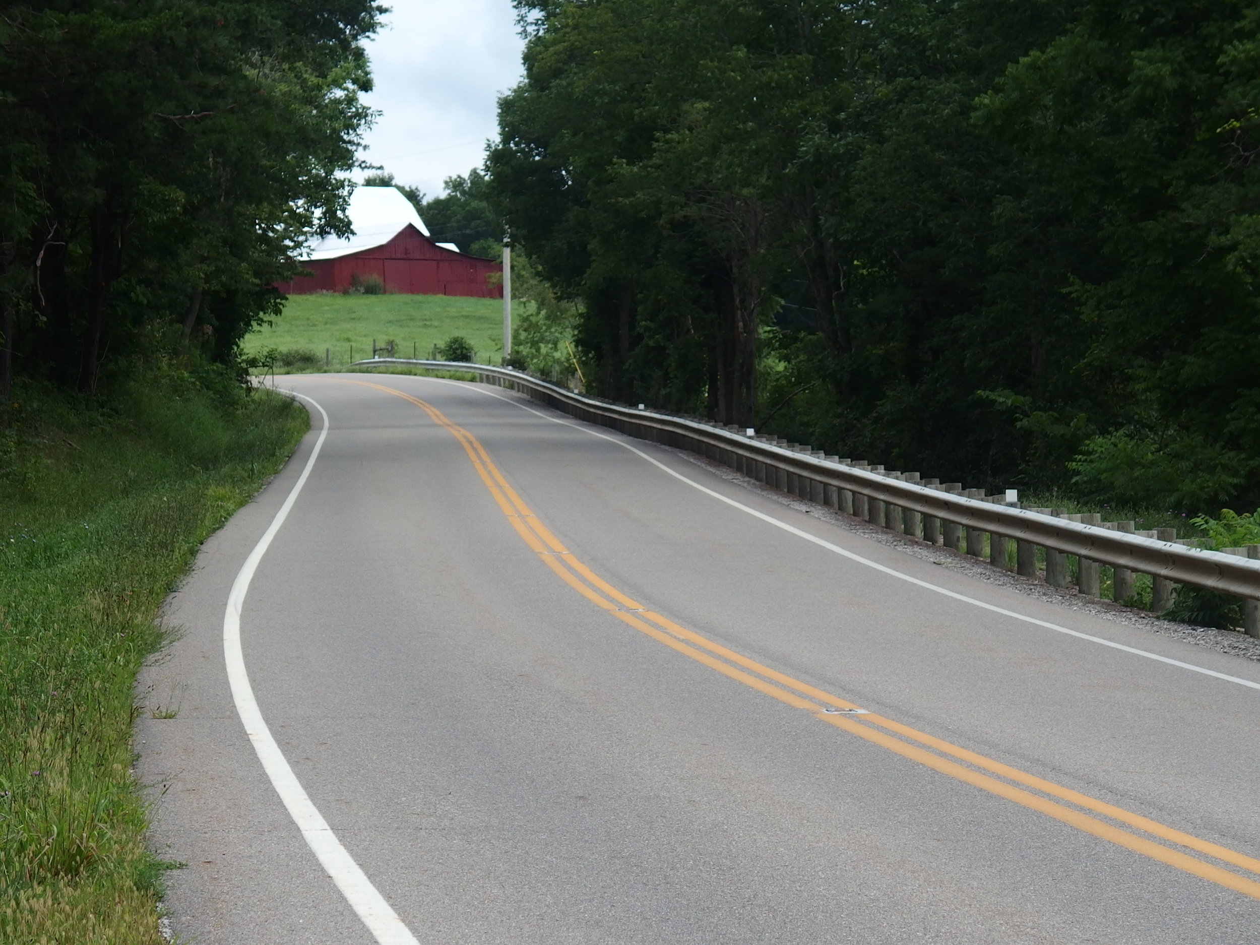 Black-topped roads that hug the countryside inspire something within me.... (Hocking Hills, Ohio 2016)
