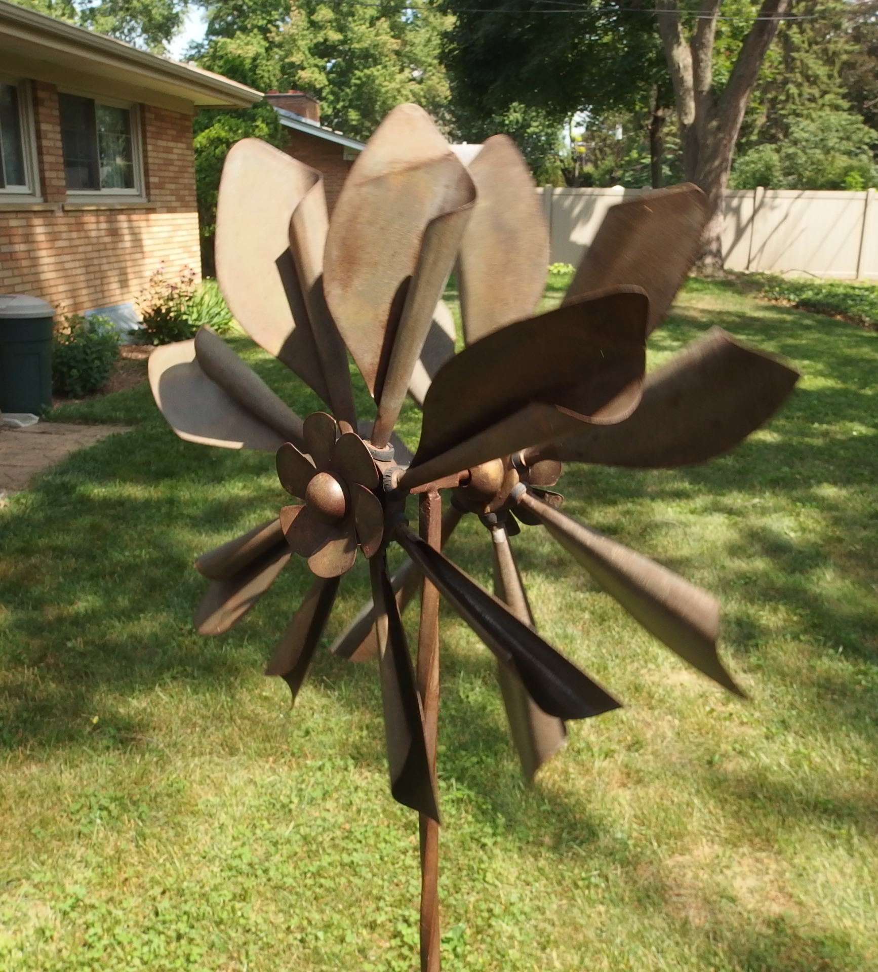 Kinetic "Daisy" wind spinner in our yard
