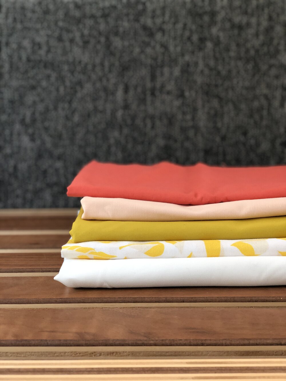 modern peppy fabric pull in bright coral, peach, citron | Lovley and Enough