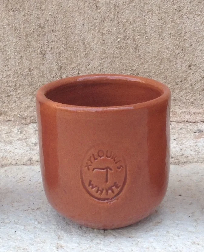 raki cups xylouris white symbol.jpg