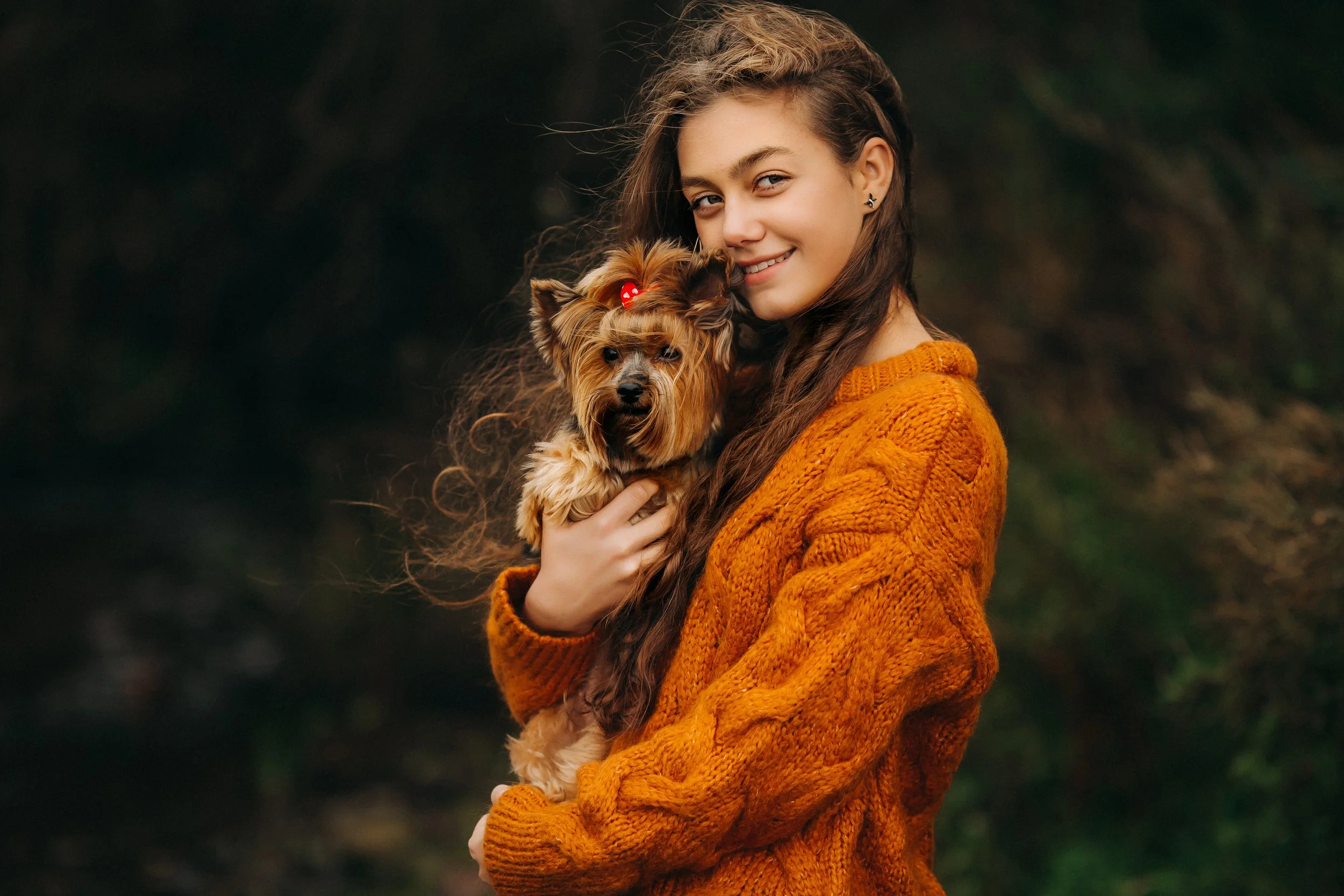 bigstock-Teenager-Girl-Holds-A-Dog-In-H-367908031.jpg