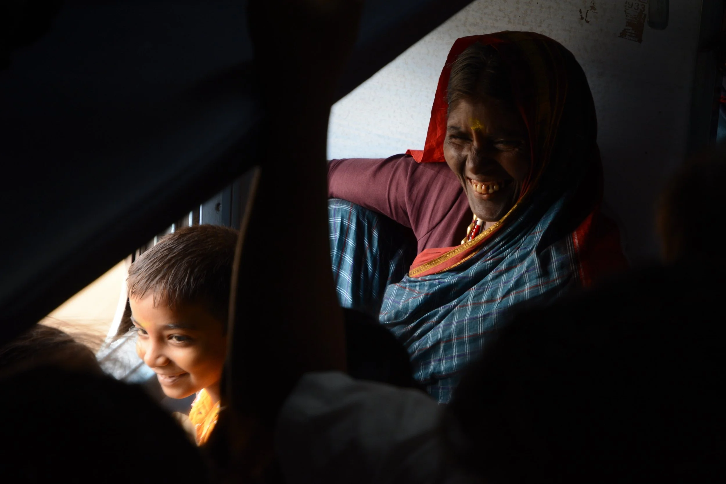 Boy and mother on train.