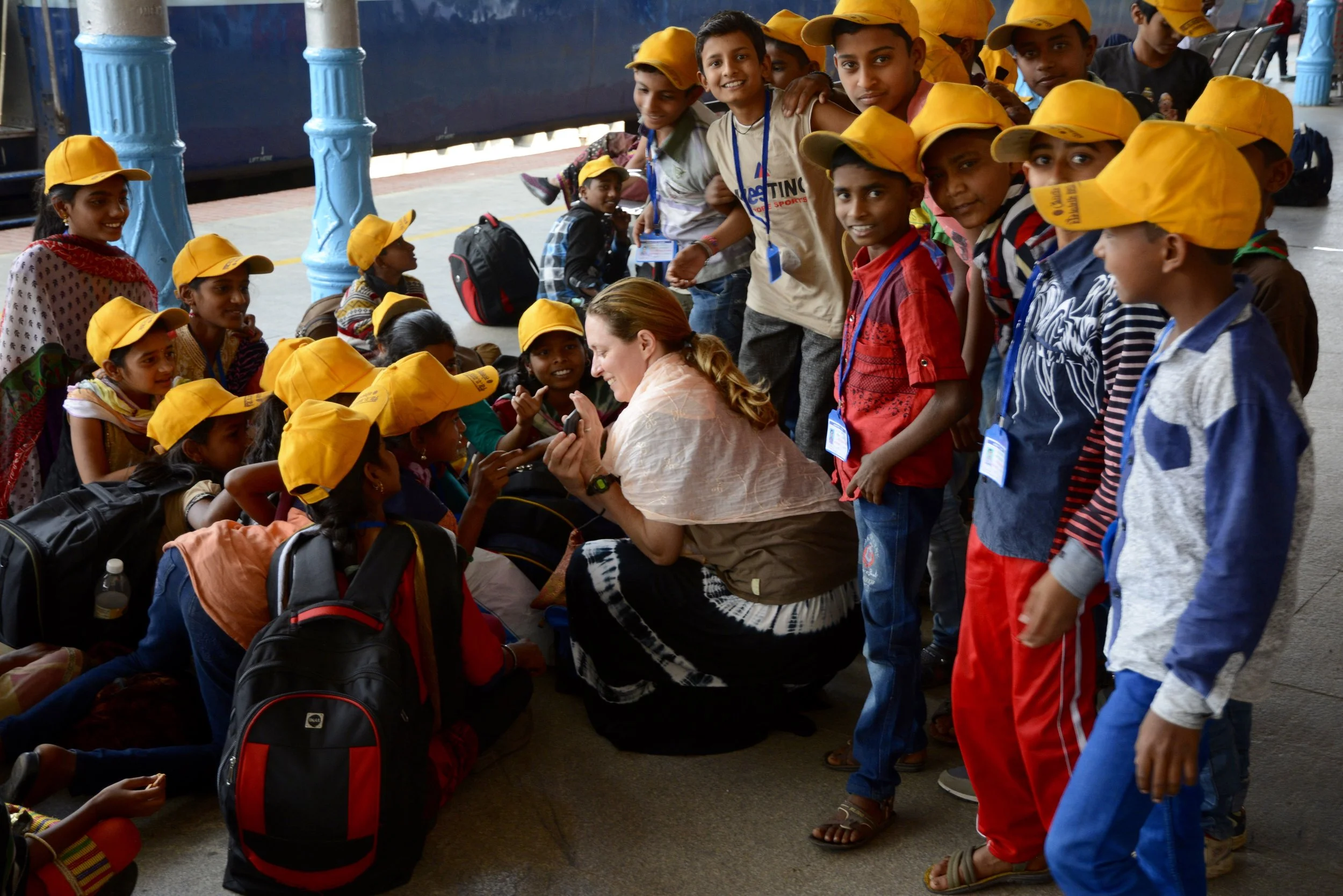 Sharing photos at train station.