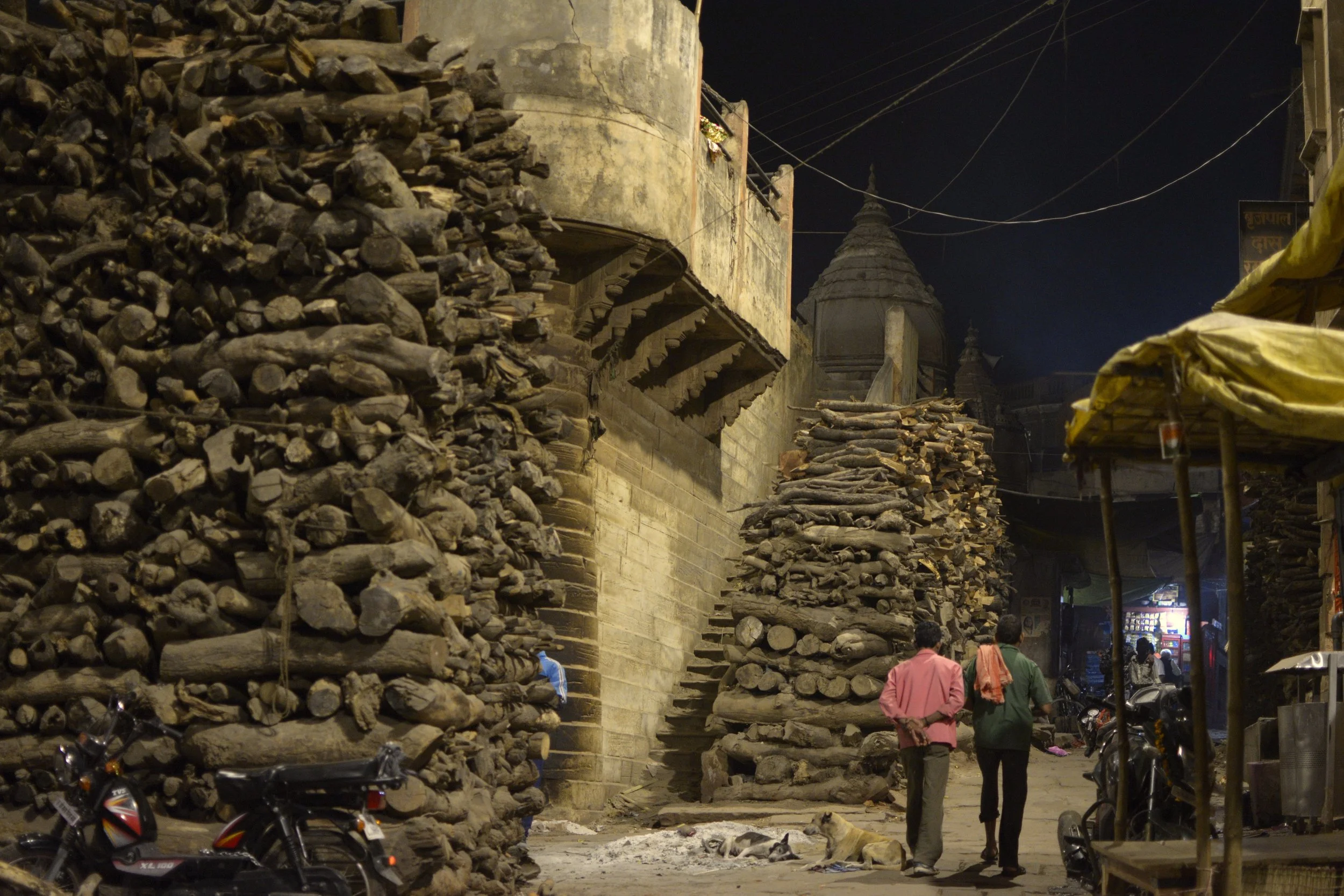 Stacks of wood for the burning ghats.