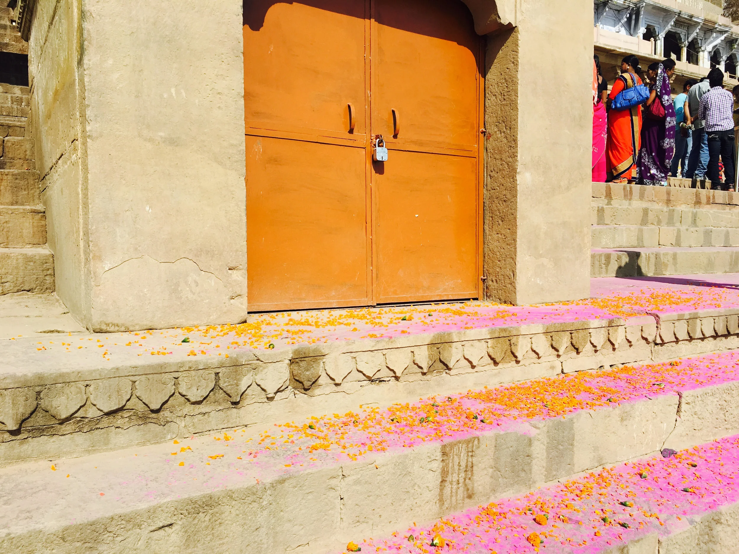 Colors on the stairs of a ghat after Holi