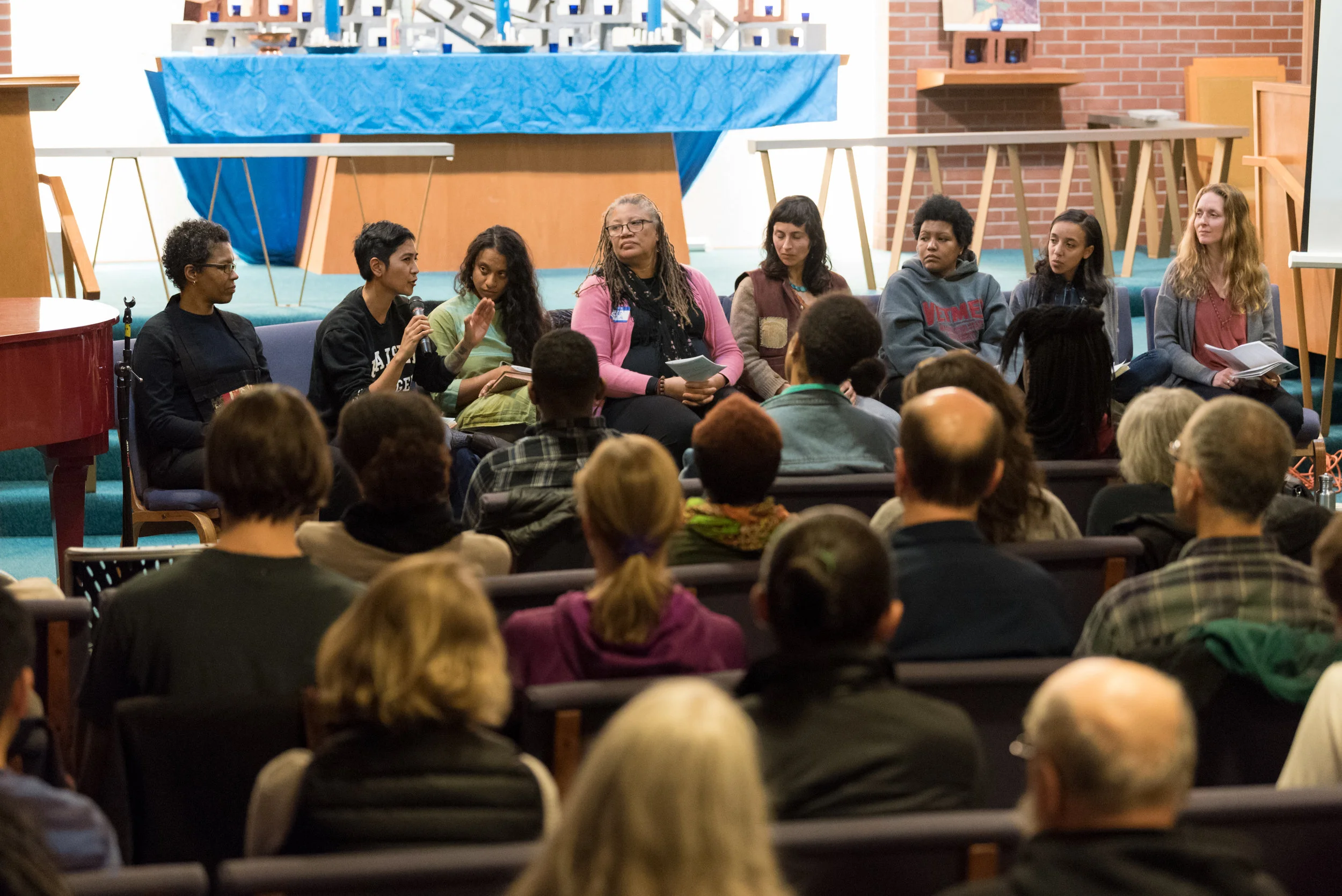Caverly Morgan, Peace in Schools' teacher Madeline Harmon, and Peace in Schools' Advisory Board member Tuere Sala on a panel discussion with angel Kyodo williams.