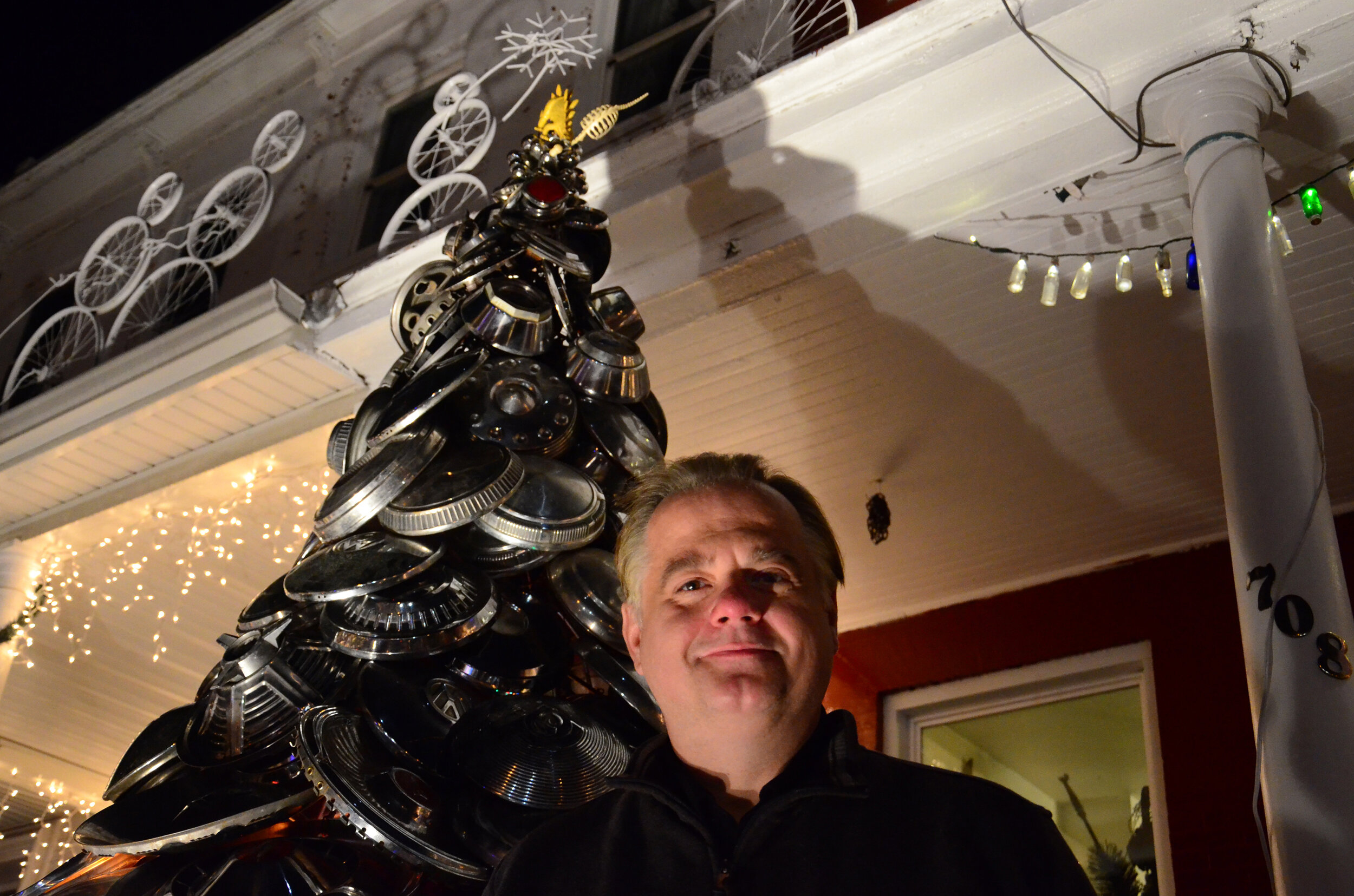 Hampden Artist Harvests Hubcaps for 10-Foot Tree