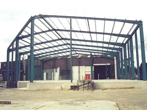 Structural steel including particularly portal frames, piers to footings and concrete floor slab.