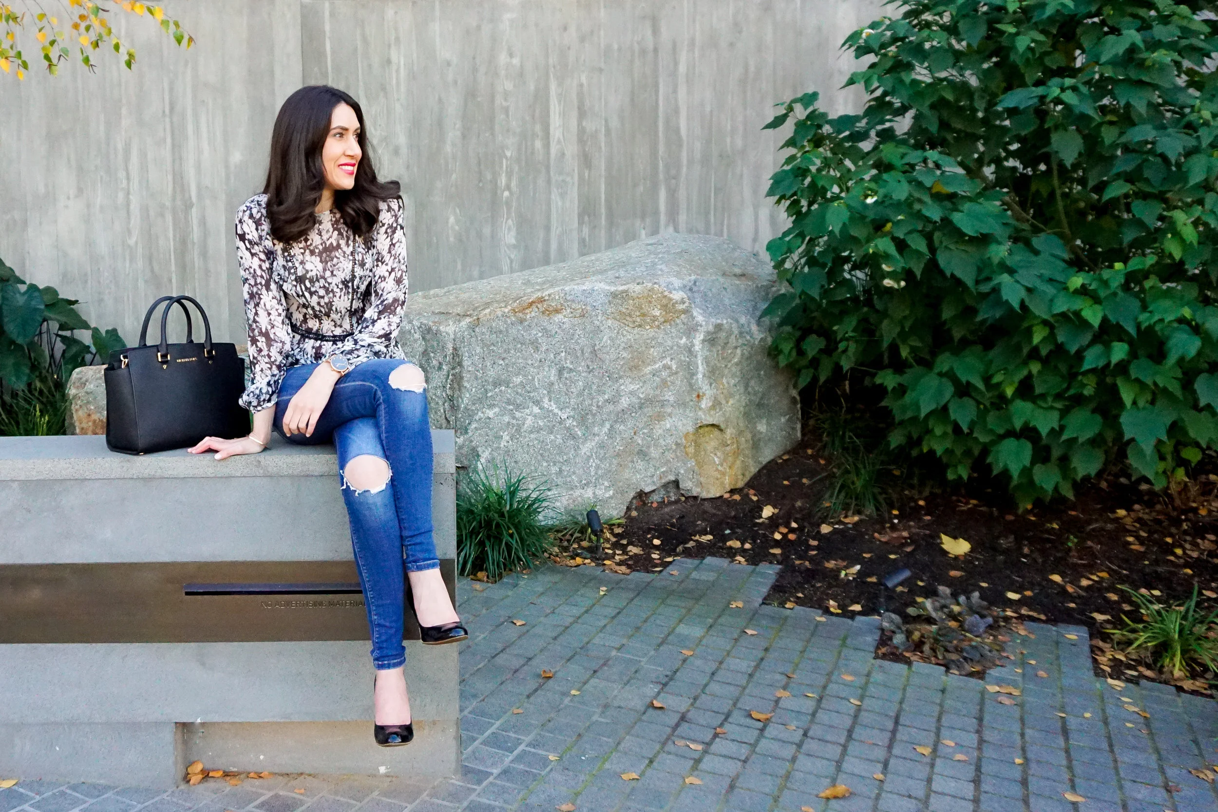 Lisa wears: Chalk Floral Silk Blouse by David Lawrence , Jeans by Zara.