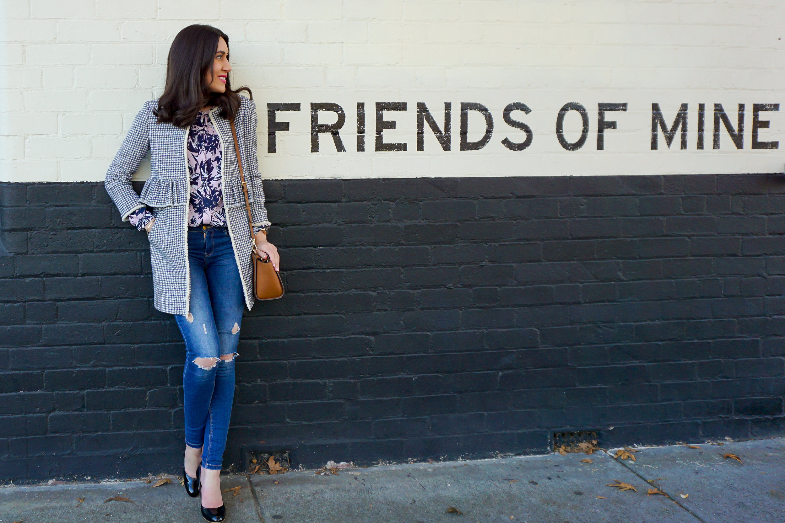Lisa wears: Floral Print Shirt by David Lawrence , Coat and Jeans by Zara.