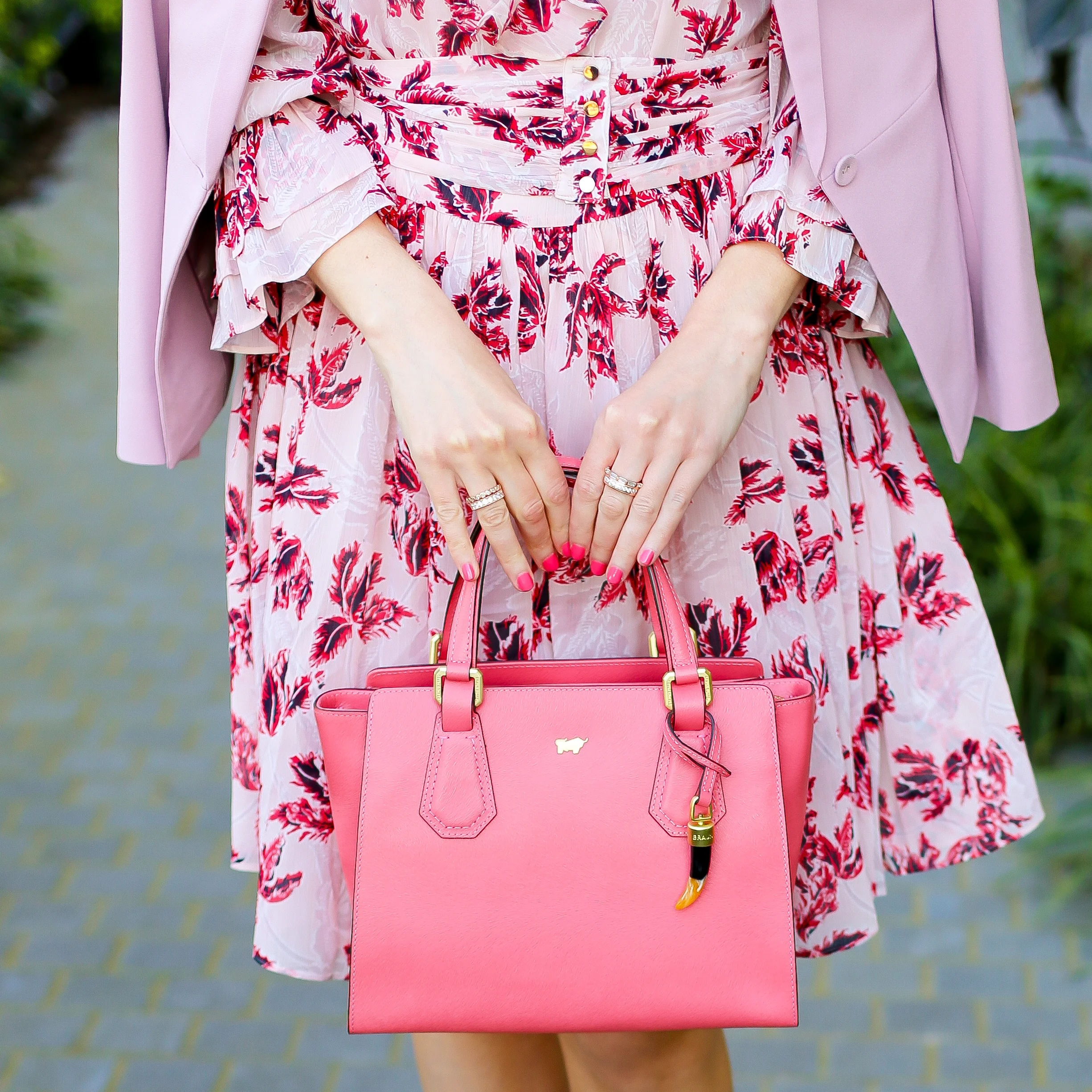 Bag by Braun Buffel ; jewellery by Sophie Catherine ; dress & jacket by Saba
