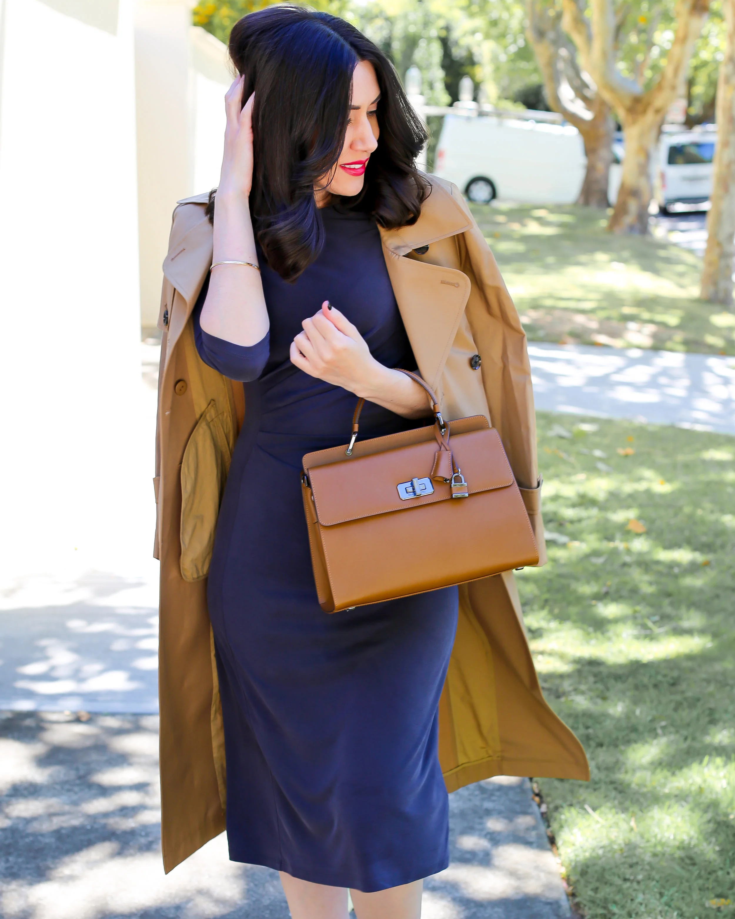 Lisa wears Saba Brooklyn Trench Coat & Penelope Drape Dress , Braun Buffel Bag
