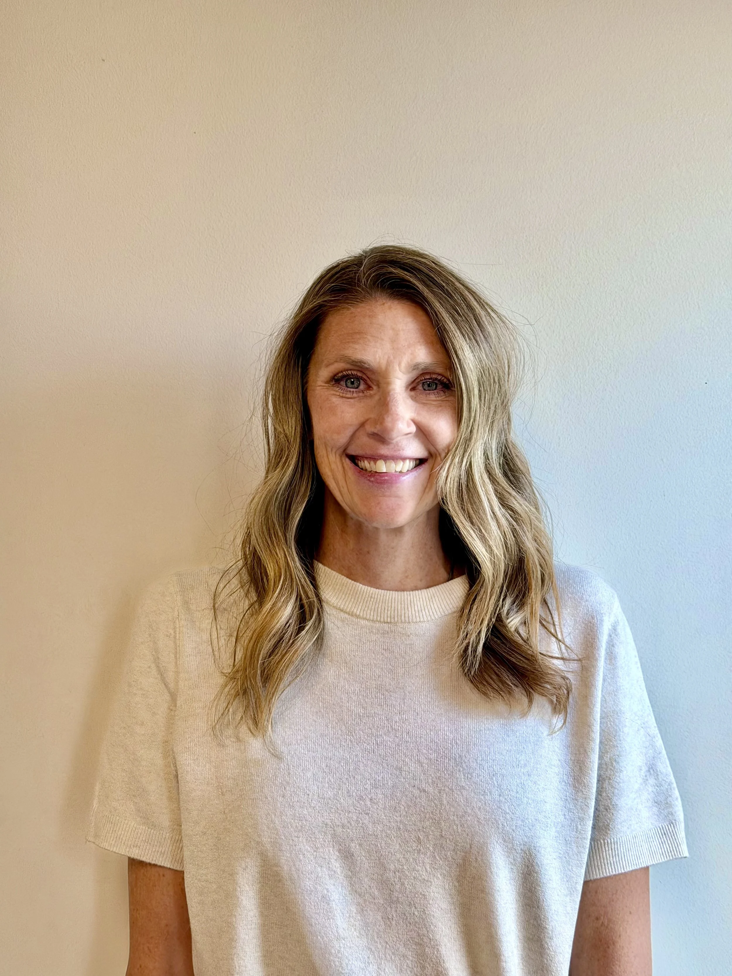 perimenopause dietitian smiling at camera