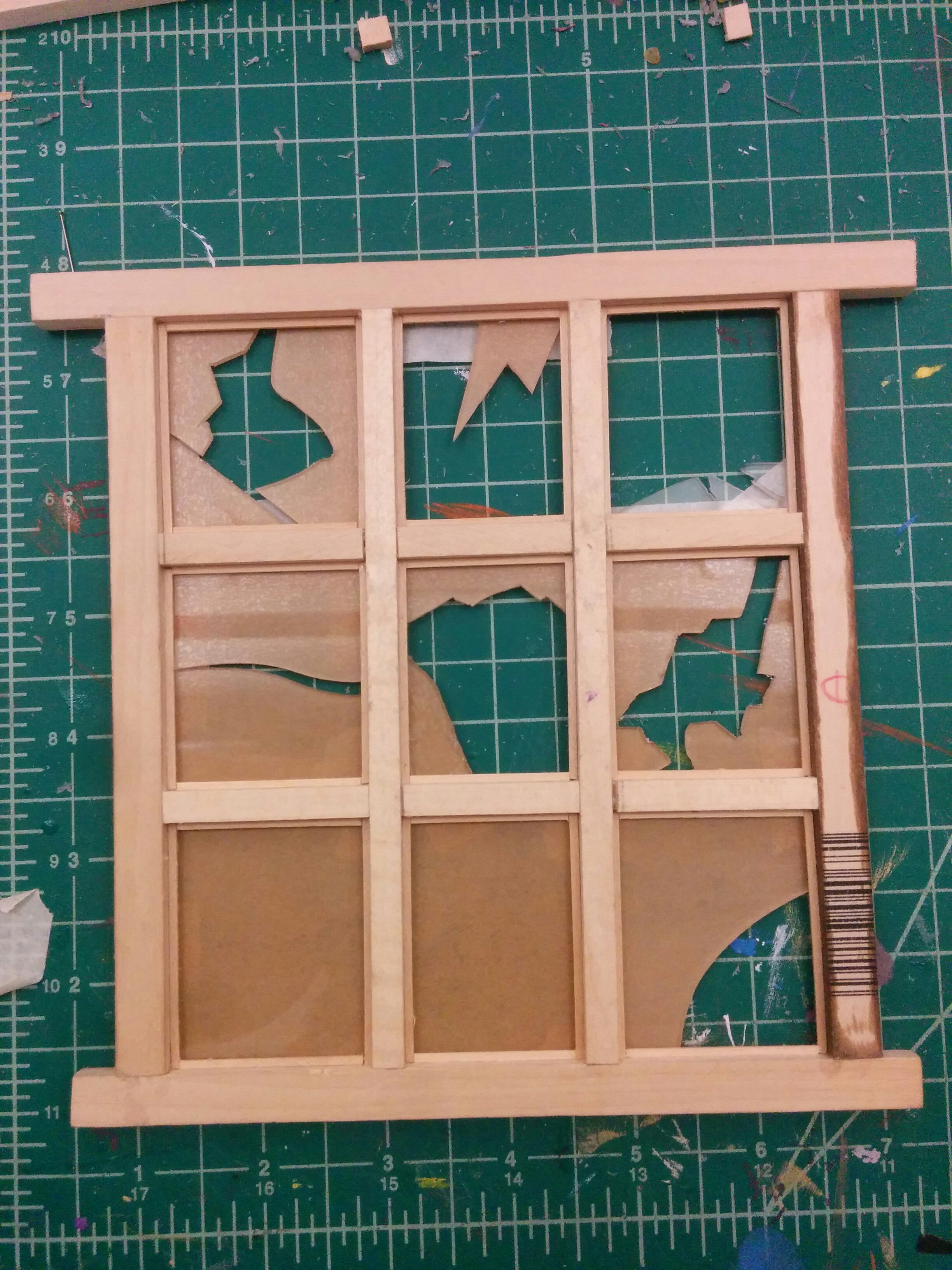  Window frame built with balsa wood strips, with 1/16th acrylic pieces used as glass. 