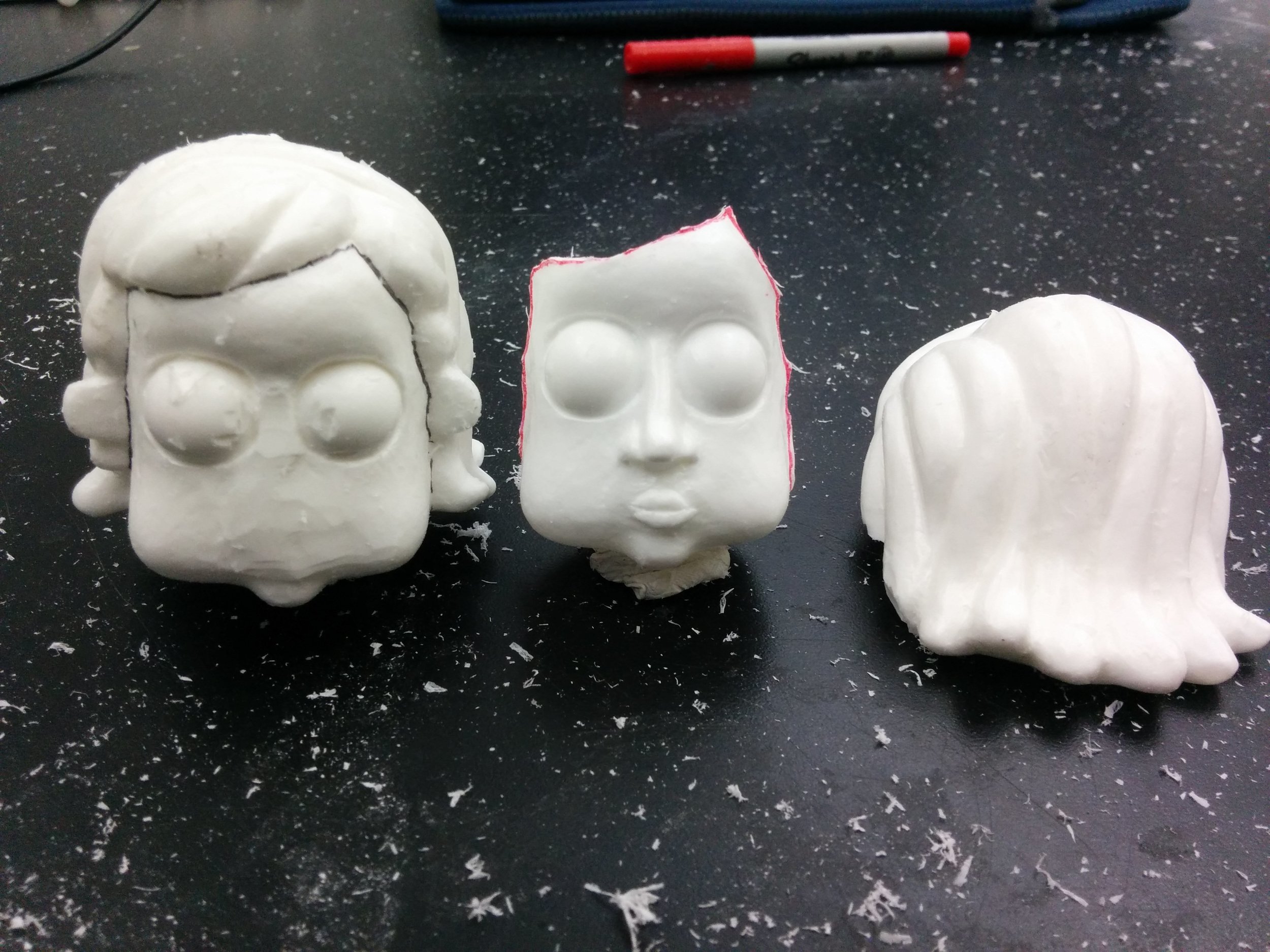  Solid and hollow casts of the head, to form the head block and replacement face. 