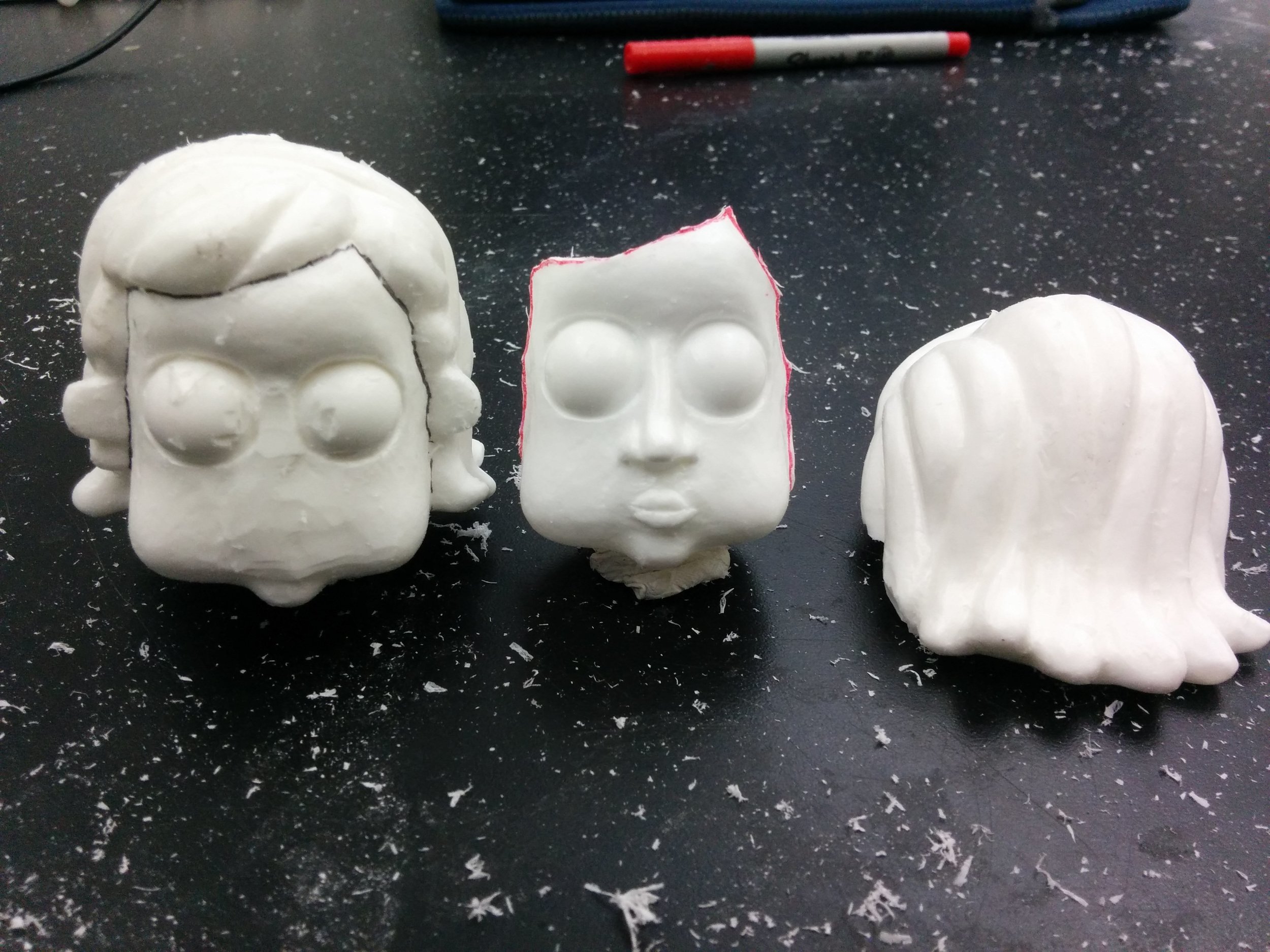 Solid and hollow casts of the head, to form the head block and replacement face.