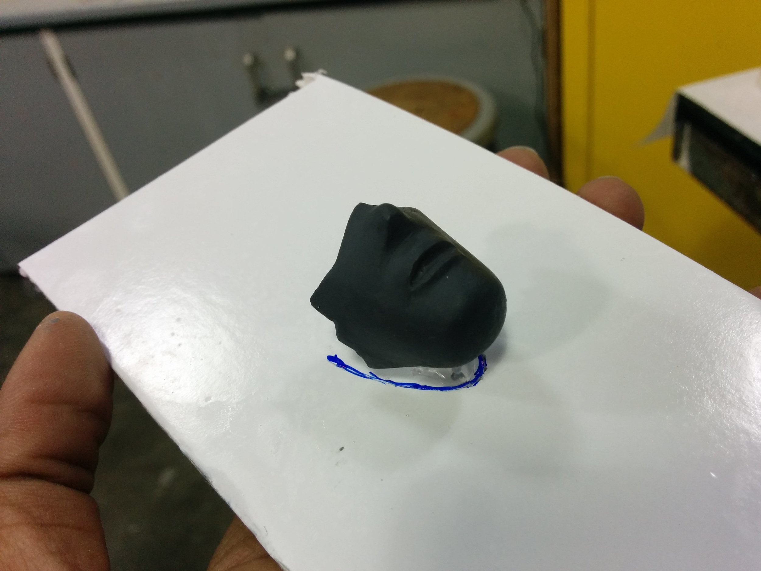 Neutral mouth shape, prepped for molding. The mold cut line marked with blue sharpie.