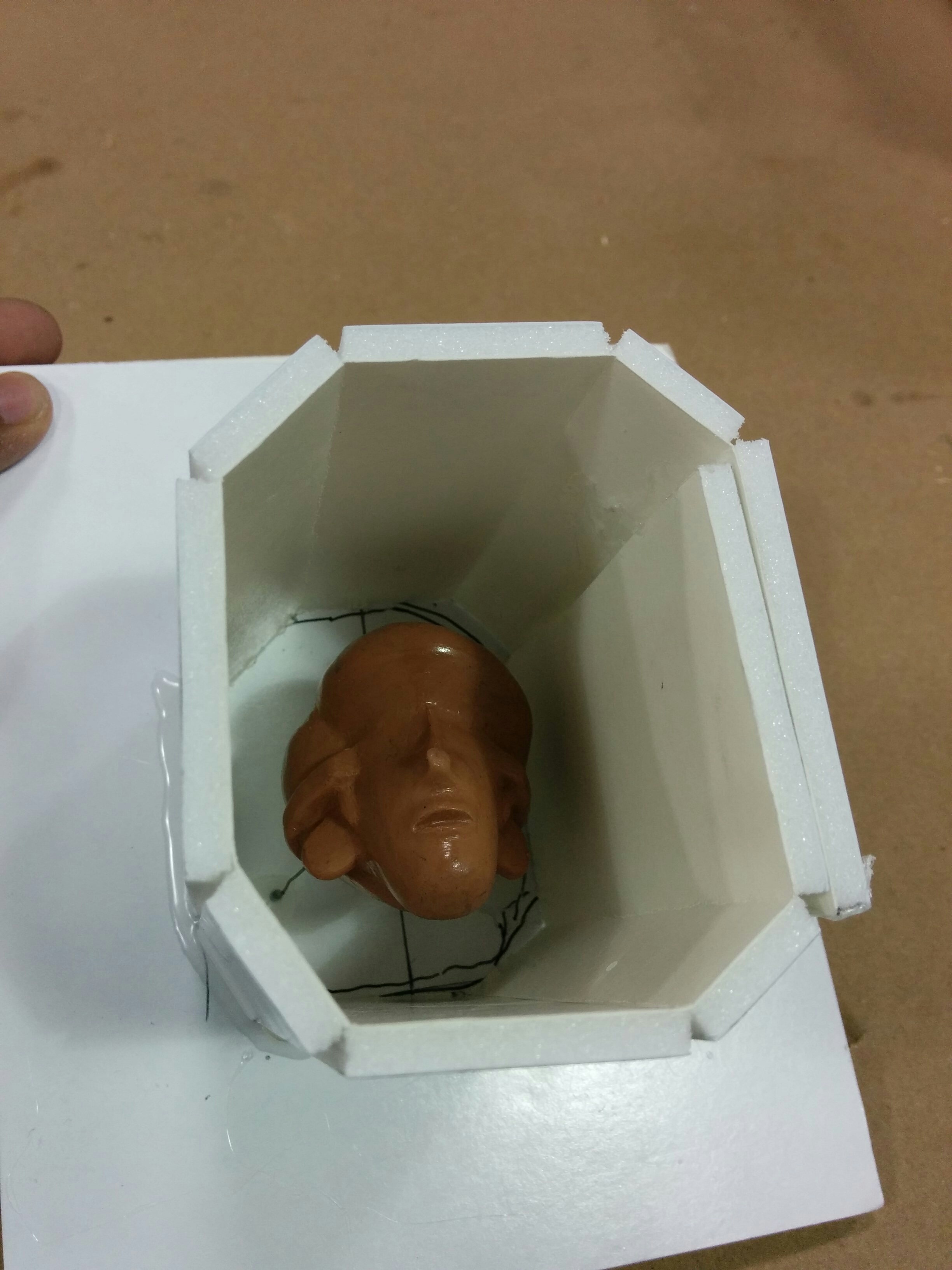 Diver head mold prepped for pouring silicone. The molds were made using a tin based silicone, Gi-1000.