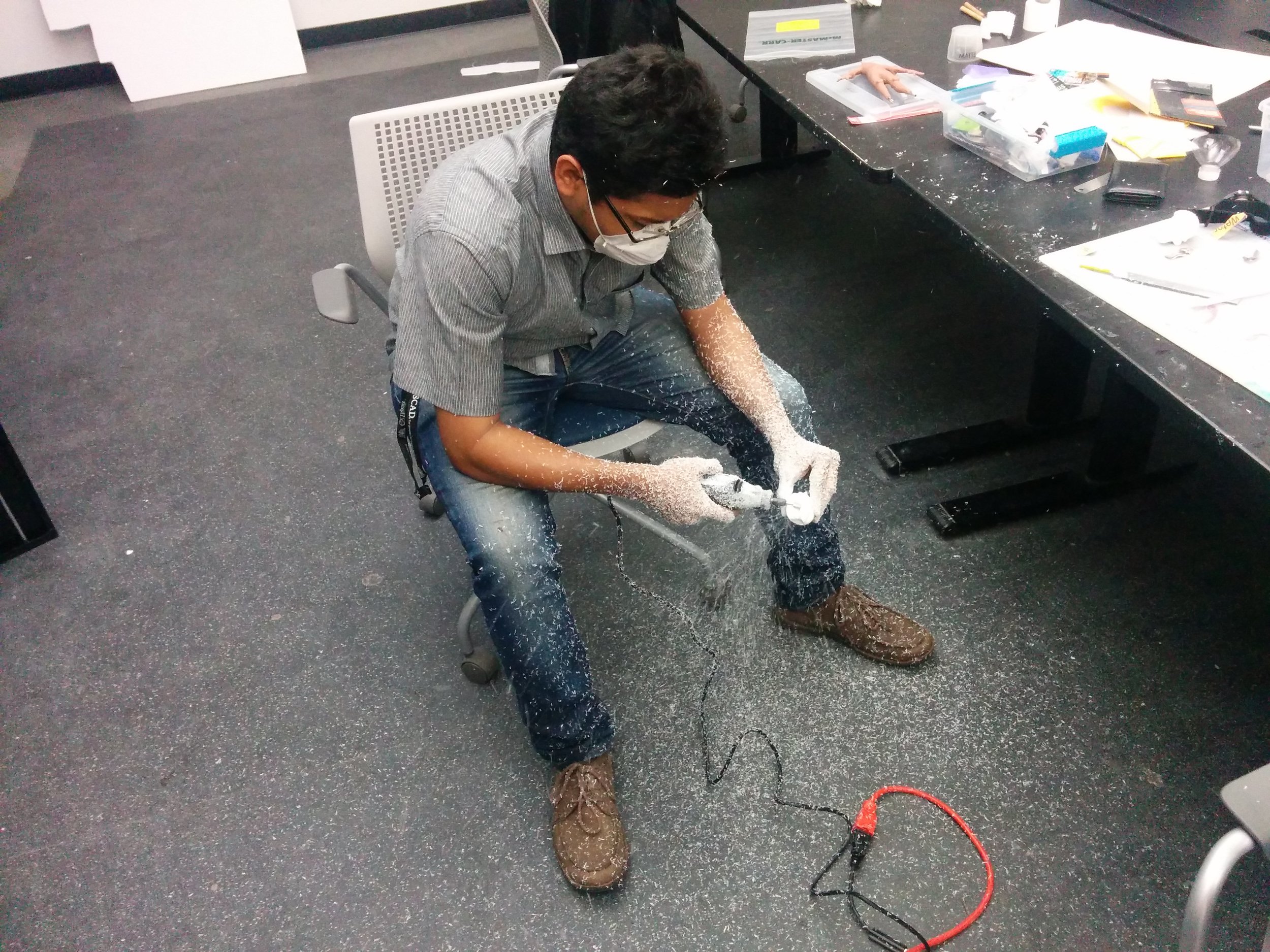 Carving the head block with a Dremel. When the animation department had not yet invested in a downdraft table.