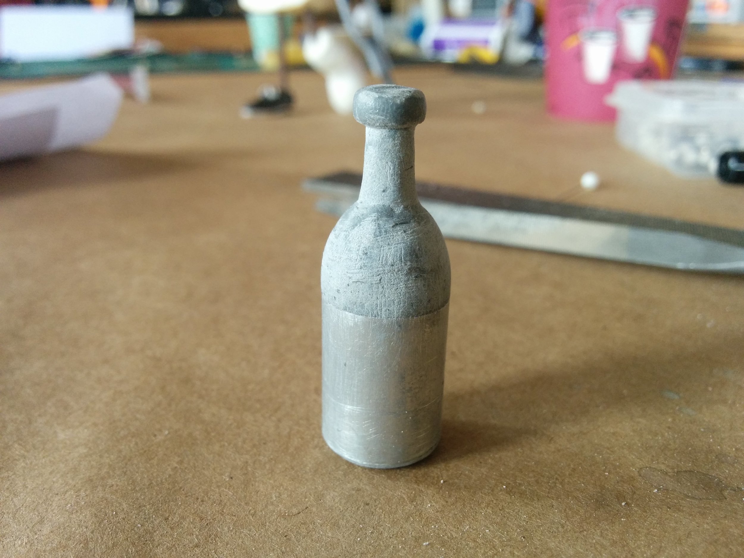  bottle prop sculpt with expoxy putty and aluminum tube base. 