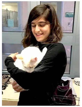 Madina and Cat Vertical Pic small.jpg