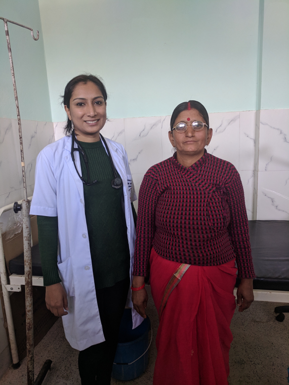 Angela with Lalita, one of many women who had returned from a previous camp following her pelvic organ prolapse surgery. She was incredibly grateful to the team.