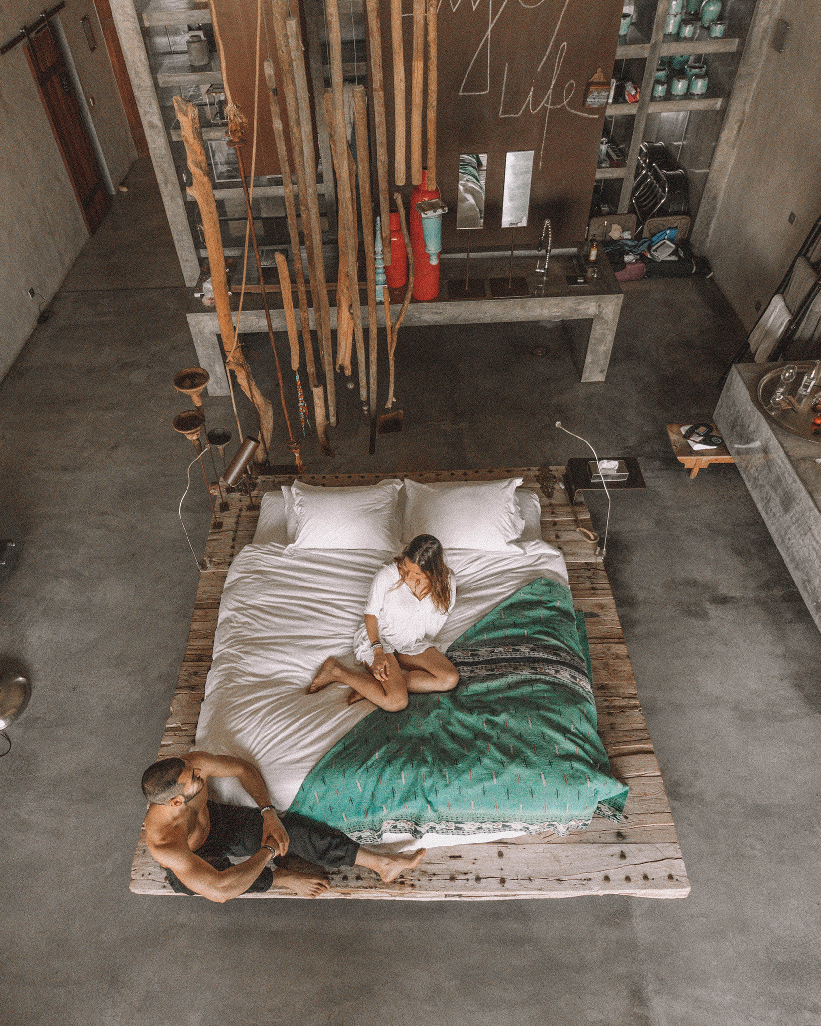 bed blanket travel couple lifestyle photography hotel room