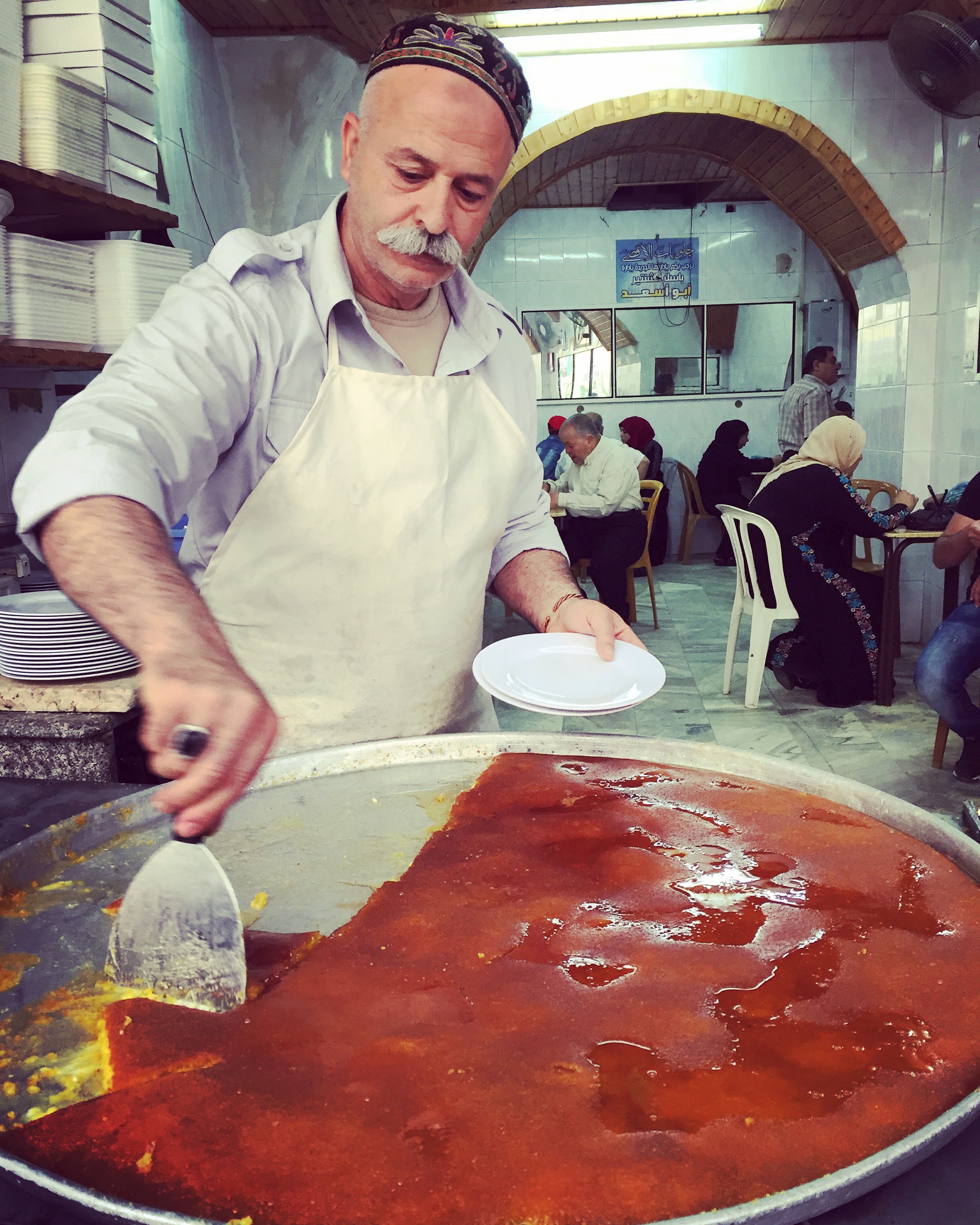 NABLUS | The famed al-Aqsa kanafe shop, a family owned institution in the old city of Nablus. I asked what makes the Naboulsi version unlike any other, everyone said it was the fresh spring water used to make the cheese. May 5, 2016. 