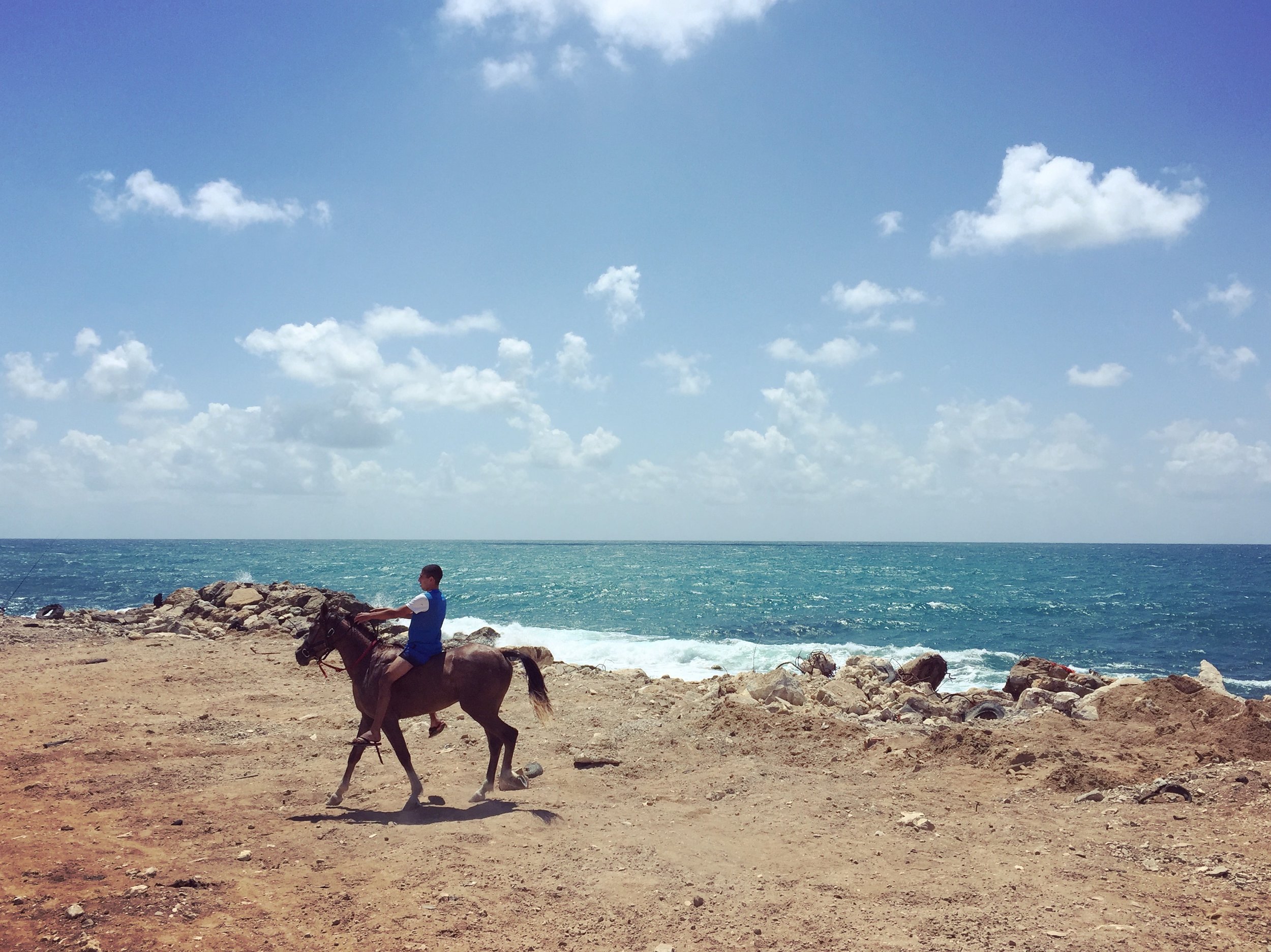 JAFFA | Boy rides a horse along the beach in the old city of Jaffa. May 27, 2016.&nbsp; 