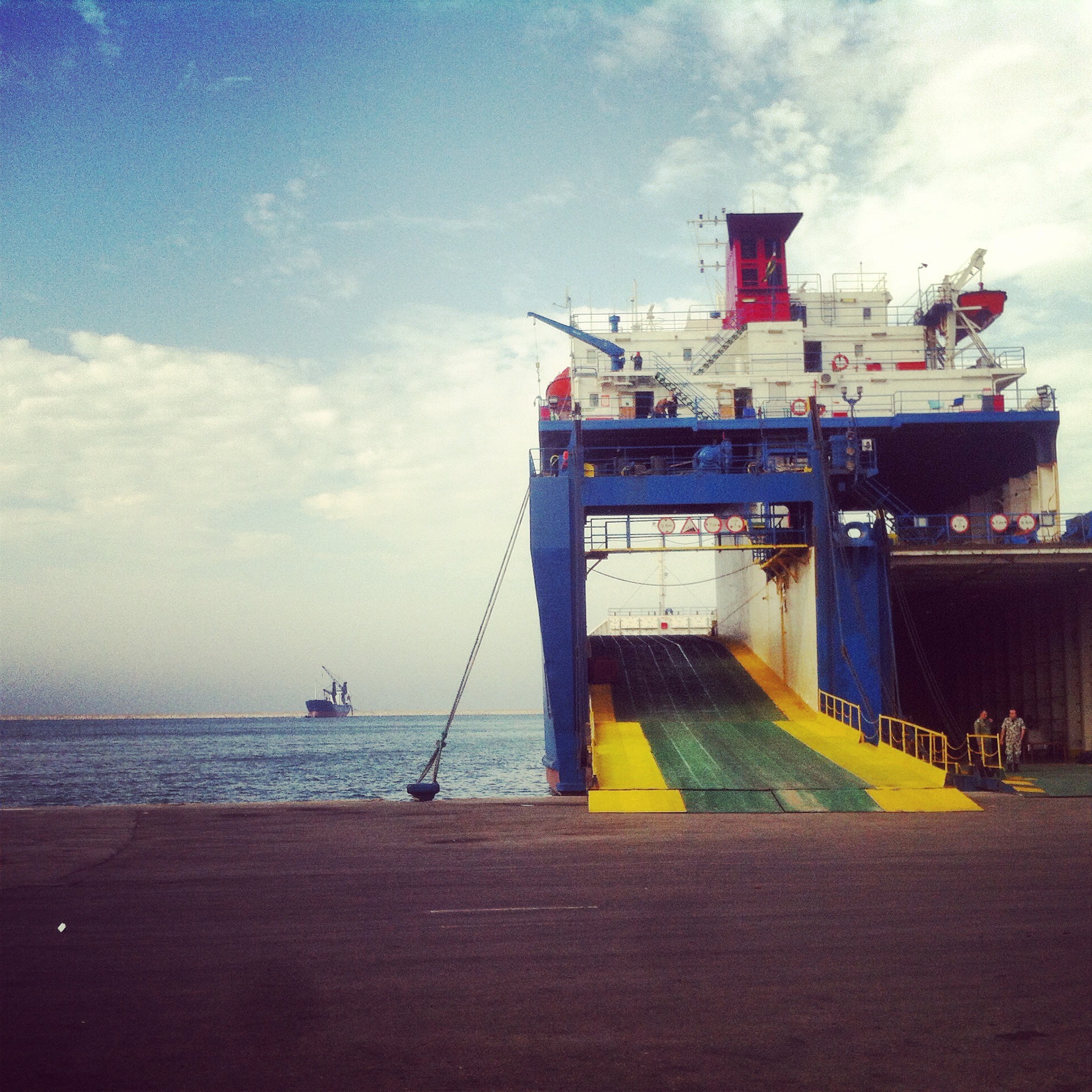  TRIPOLI | The view from Tripoli's port. Before the Syrian uprising in 2011, nearly 300,000 tons of cargo was docked from Eastern Europe on this harbor, most of this is transferred to Syria and Iraq by truck.&nbsp;Today a few courageous truck drivers