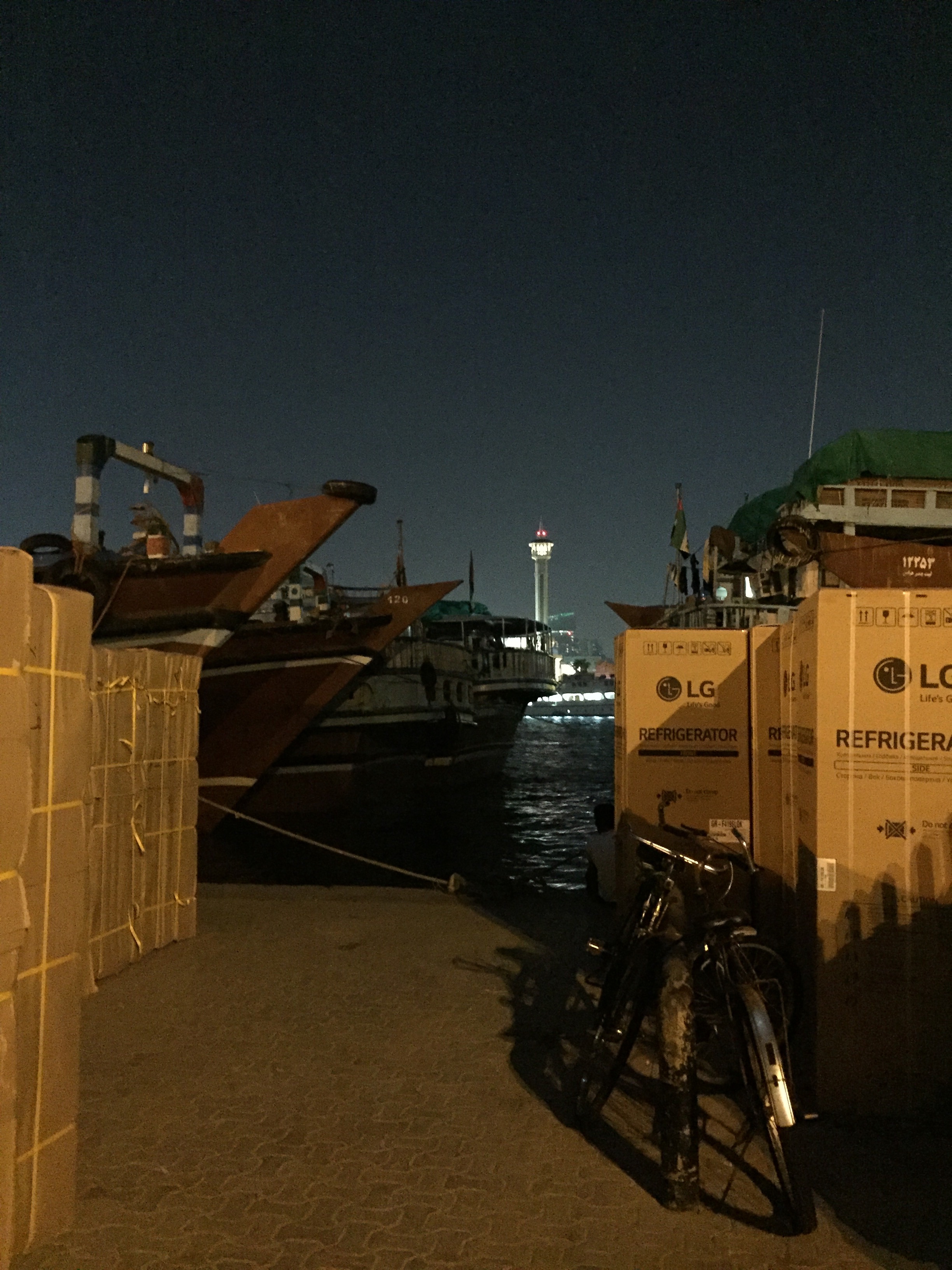  DUBAI | Piles of boxes with goods as diverse as refrigerators, furniture and good line the wharves in Dubai Creek. Workers from Pakistan, Somalia, Iran and India load the cargo to bring back to their home countries, navigating a path used by traders