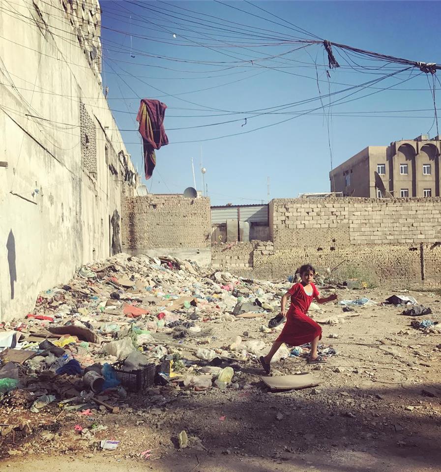  BAGHDAD | A girl skips down the residential street of Karada, in the capital. April 23, 2018.  