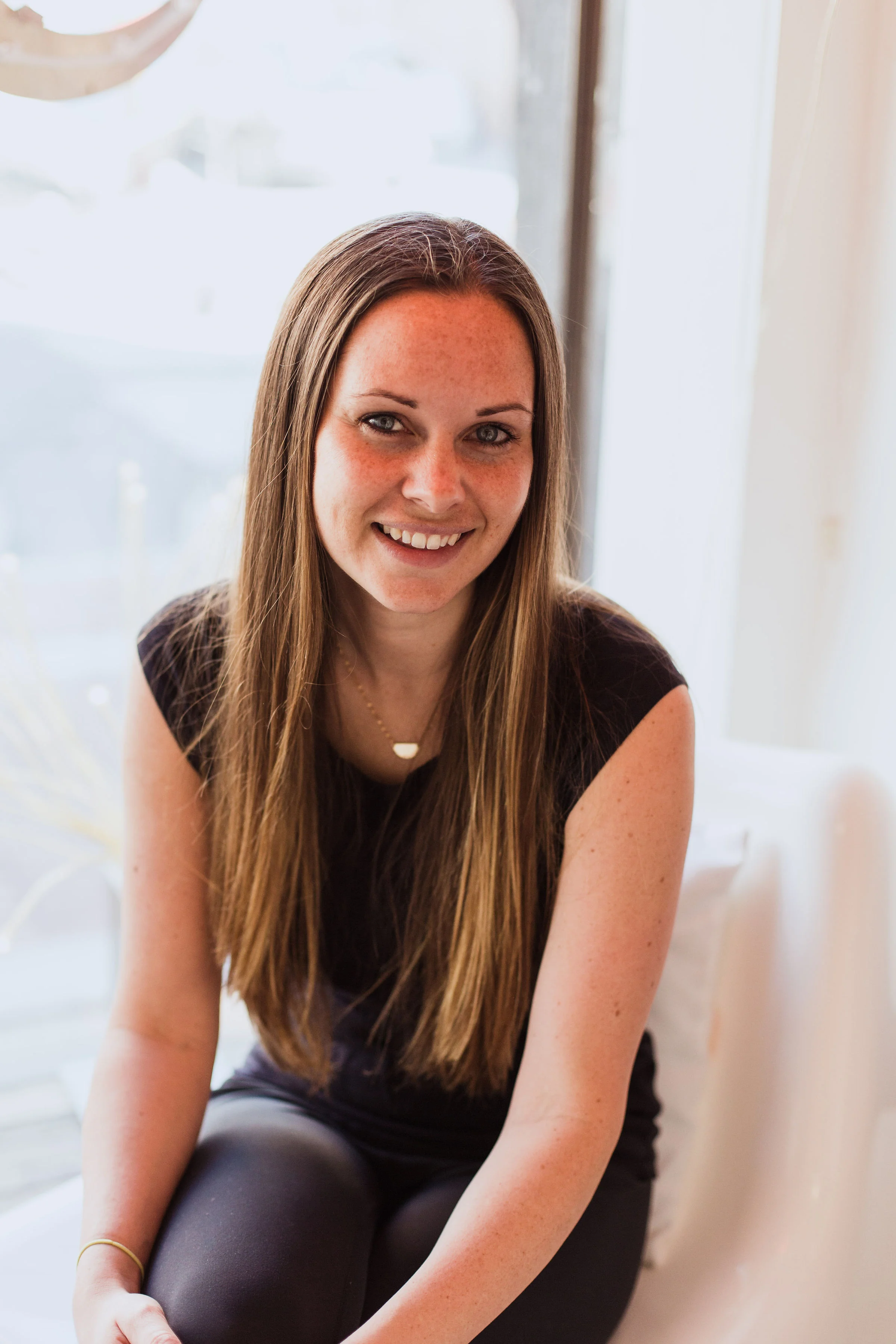 Amber TOLA Headshot.jpg