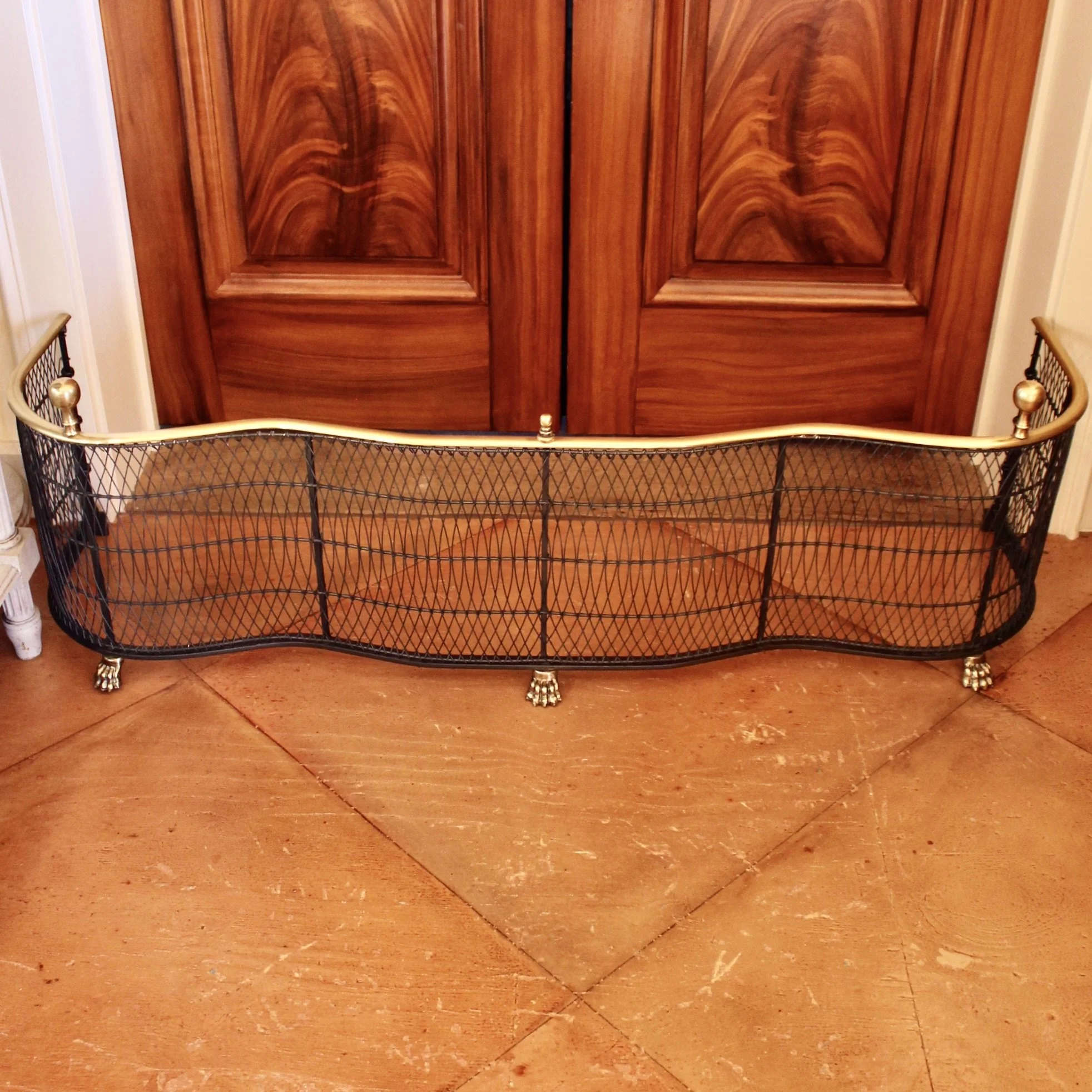 Brass Bound Wirework Serpentine Fender on Brass Paw Feet