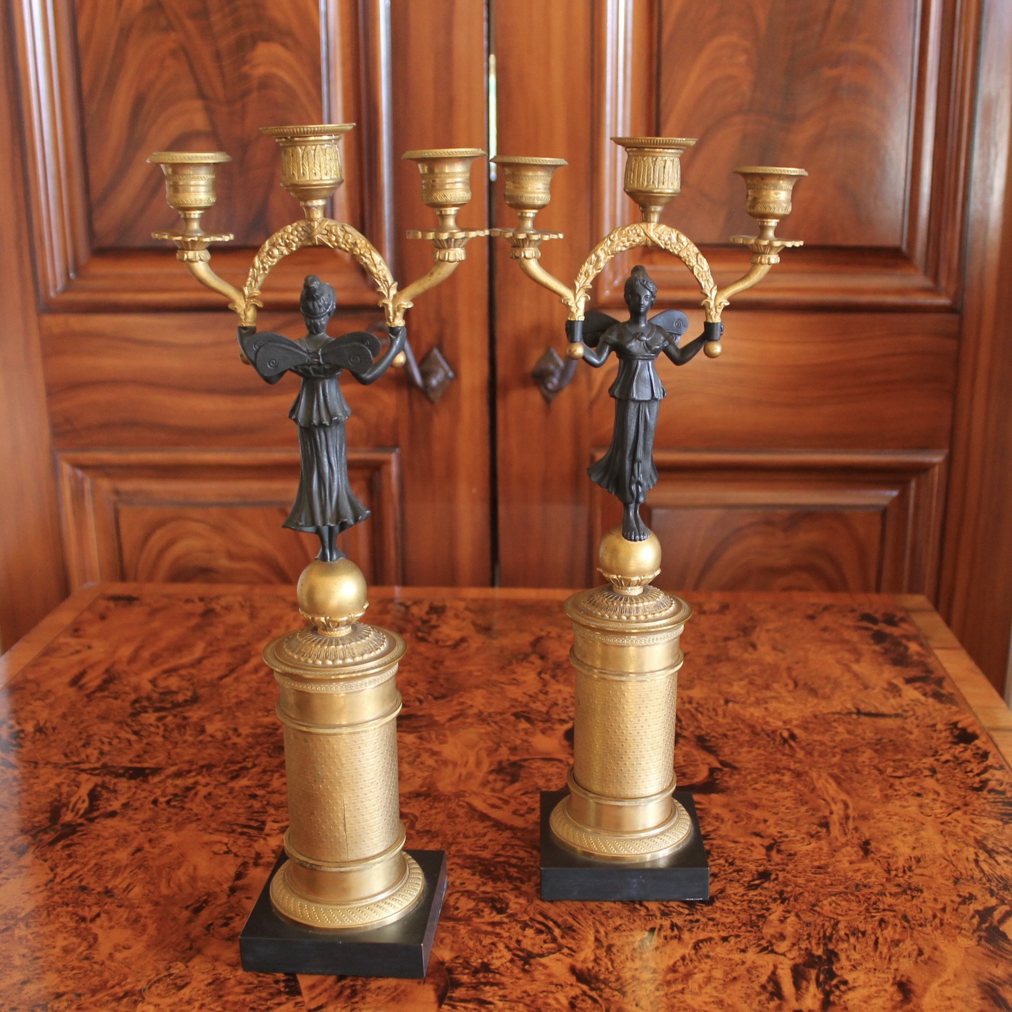 Pair of Continental Gilt Figural Neoclassical Candelabra