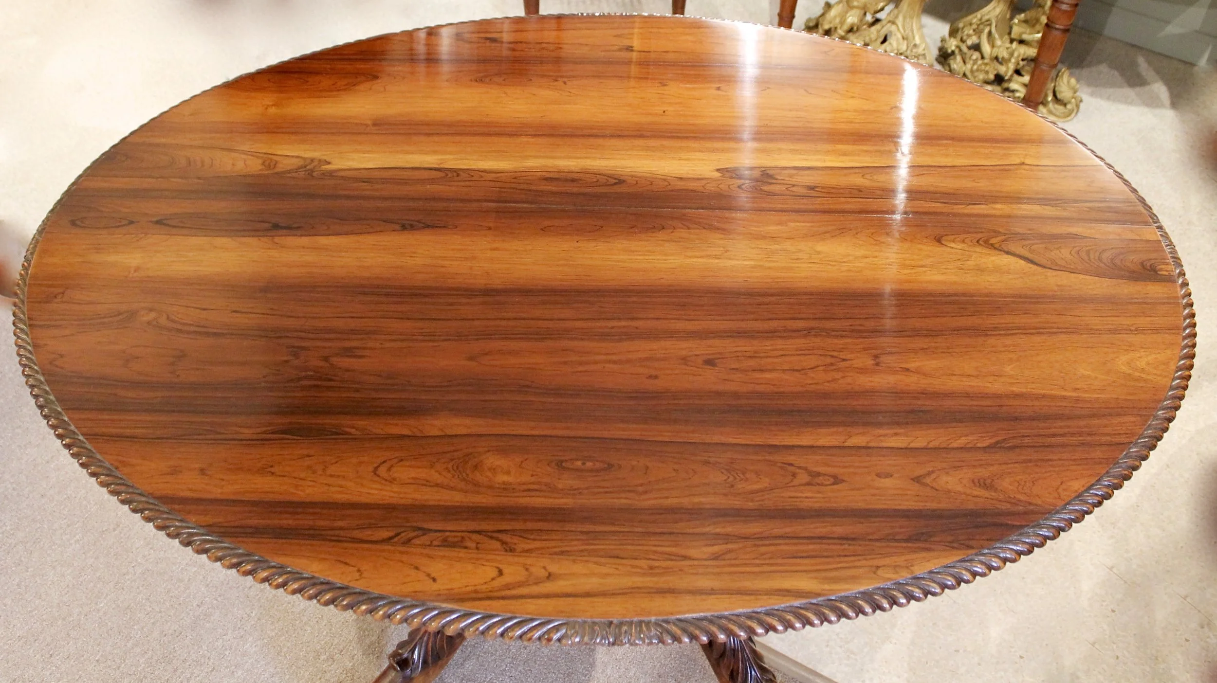 Anglo Indian Oval Rosewood Center Table or Breakfast Table with Carved Pedestal Base, 19th Century