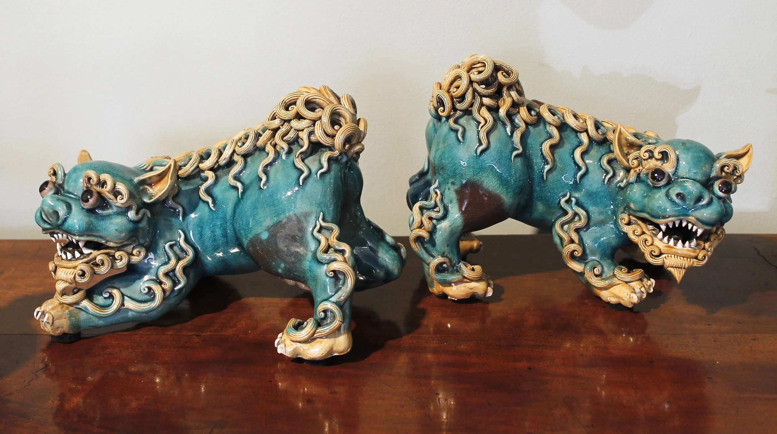 Pair of Aqua Glazed Chinese Terracotta Foo Dogs with Curly Fur