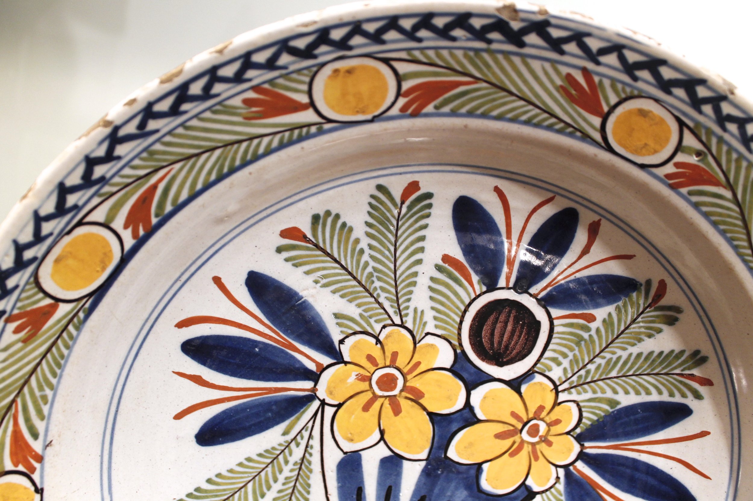 Large Polychrome Delft Charger with Flower Vase, 18th Century, 13 ½ Inche