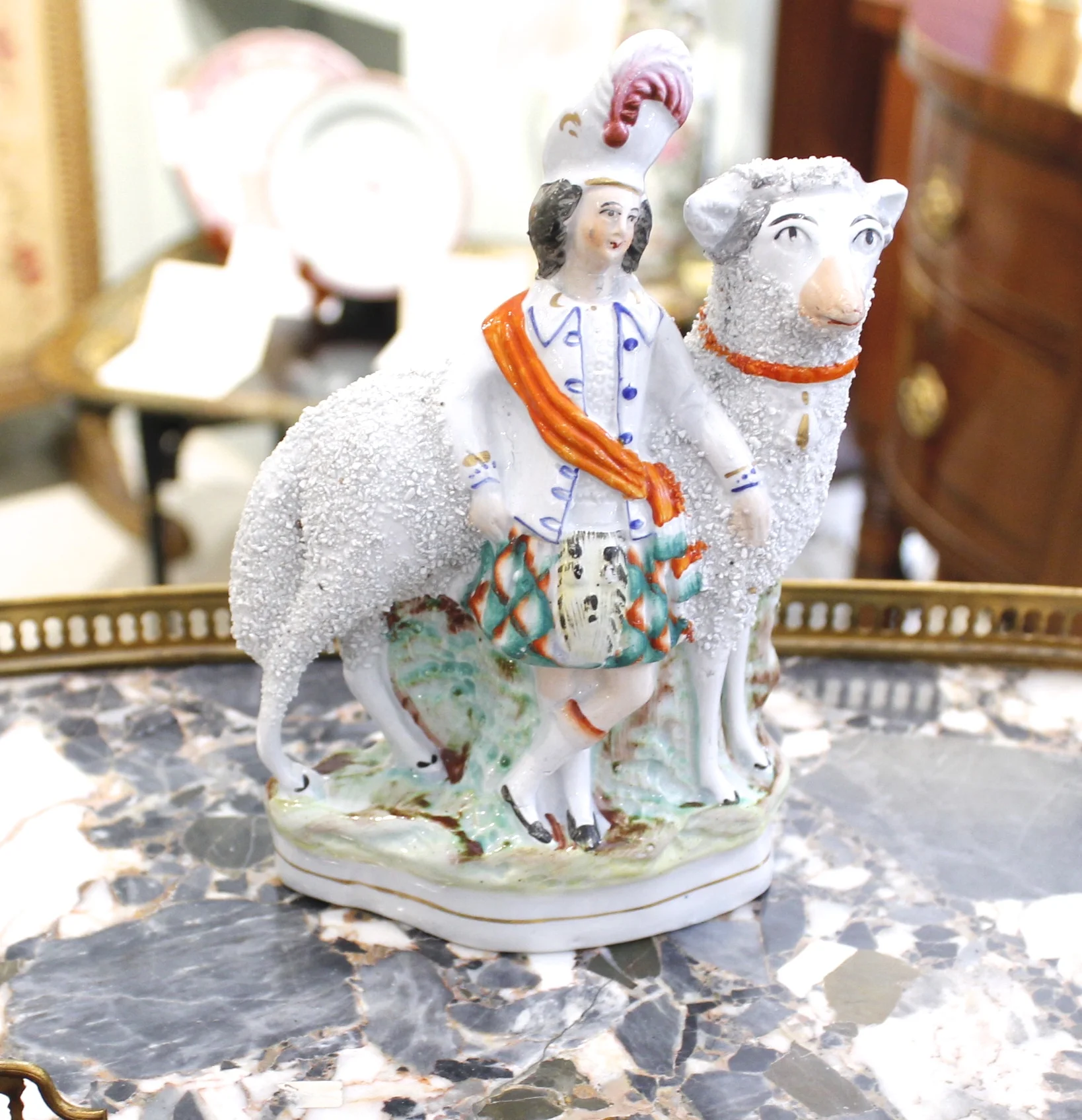 Pair of Staffordshire Scottish Figures with Large Sheep