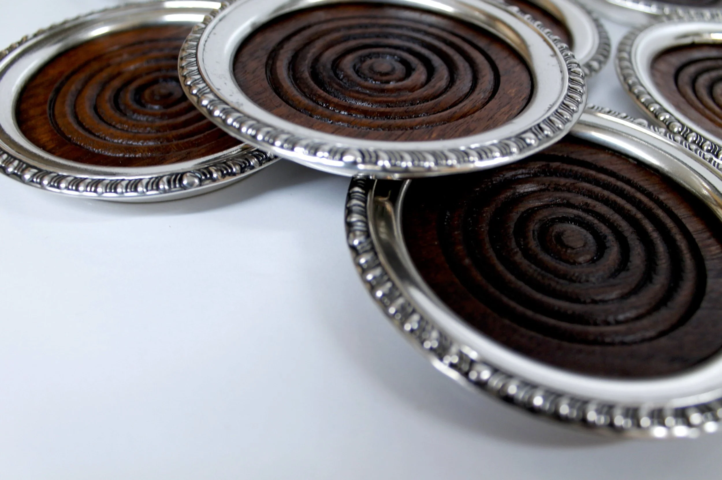 Sterling and Mahogany Coasters